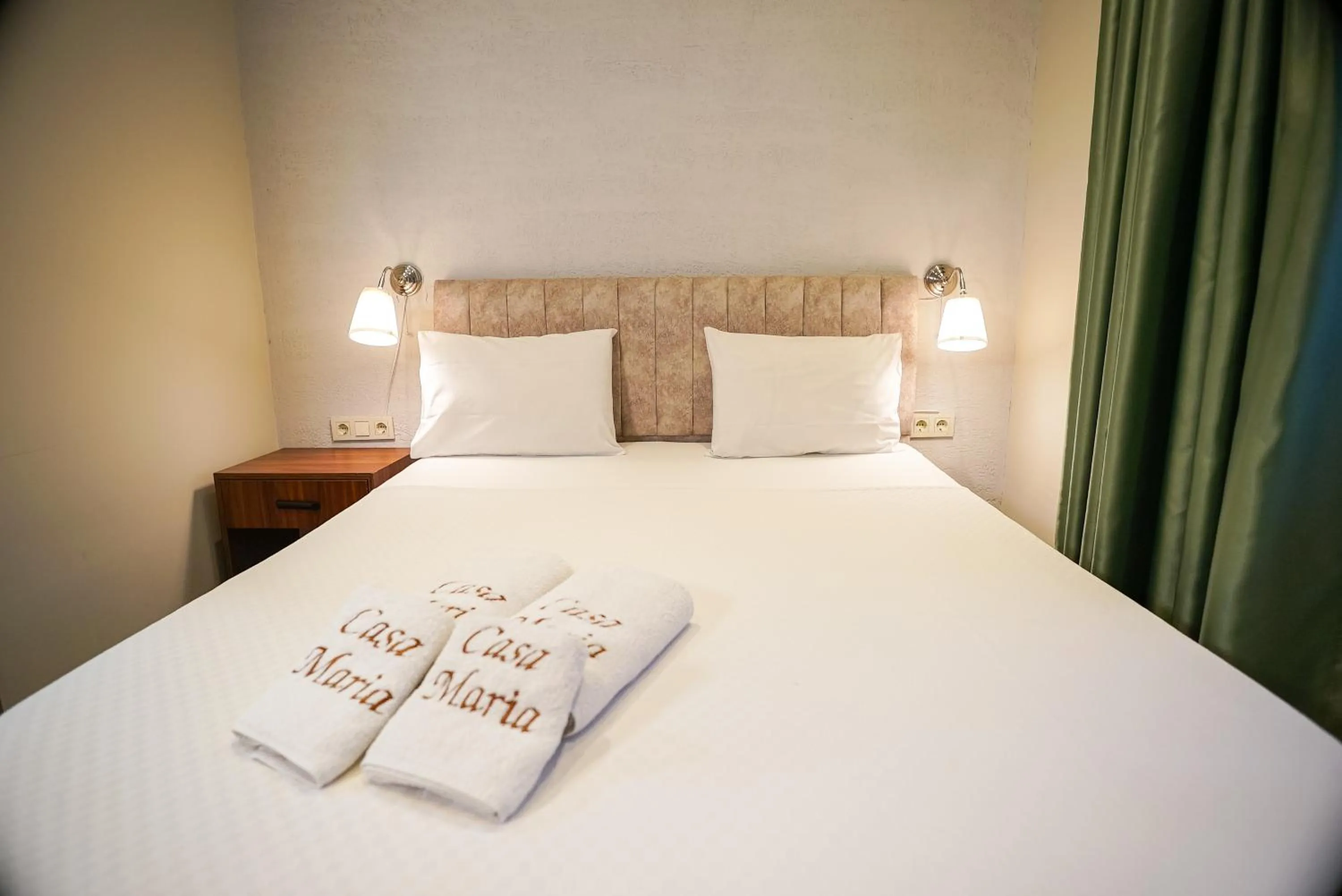 Bed in Casa Maria Hotel