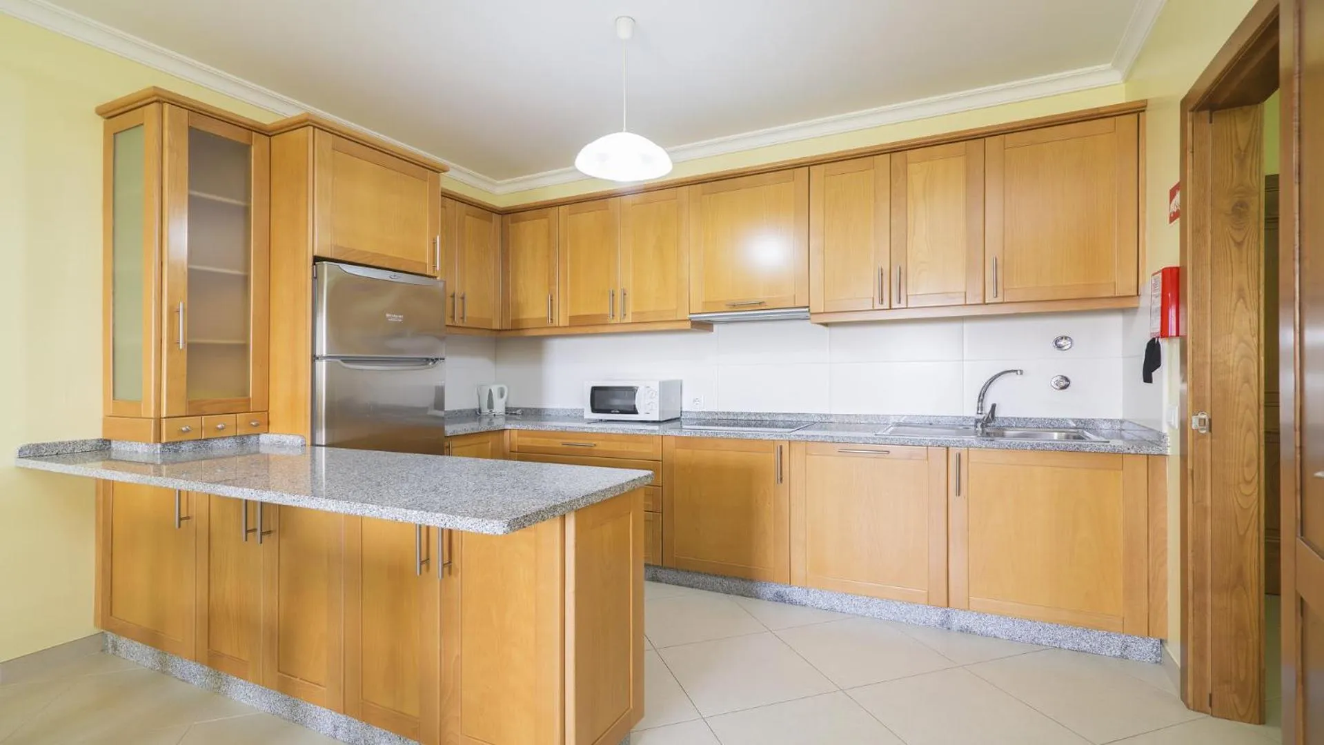 Kitchen or kitchenette in Apartamentos Vista Mar