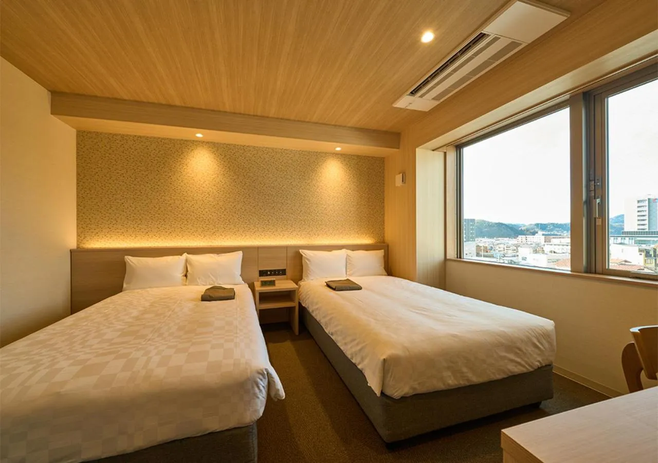 Photo of the whole room, Bed in Hotel and Spa Gift TAKAYAMA