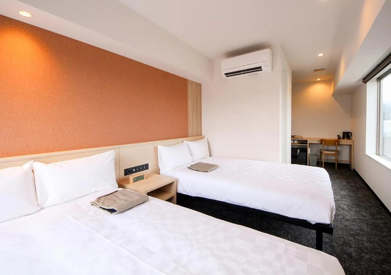 Photo of the whole room, Bed in Hotel and Spa Gift TAKAYAMA