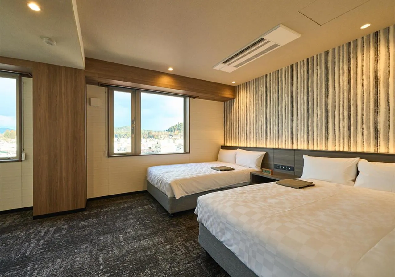 Photo of the whole room, Bed in Hotel and Spa Gift TAKAYAMA