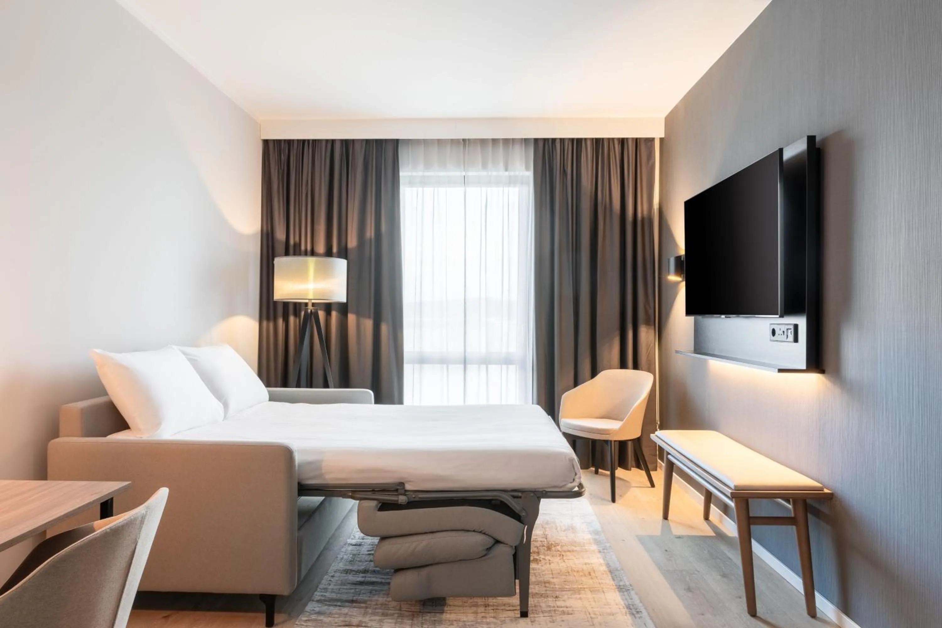 Photo of the whole room, Bed in AC Hotel by Marriott Inverness