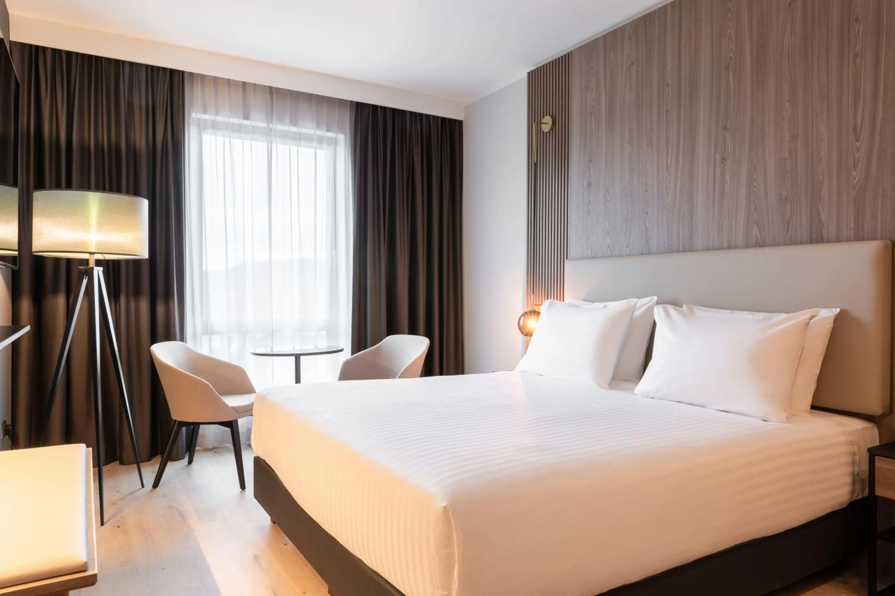 Photo of the whole room, Bed in AC Hotel by Marriott Inverness