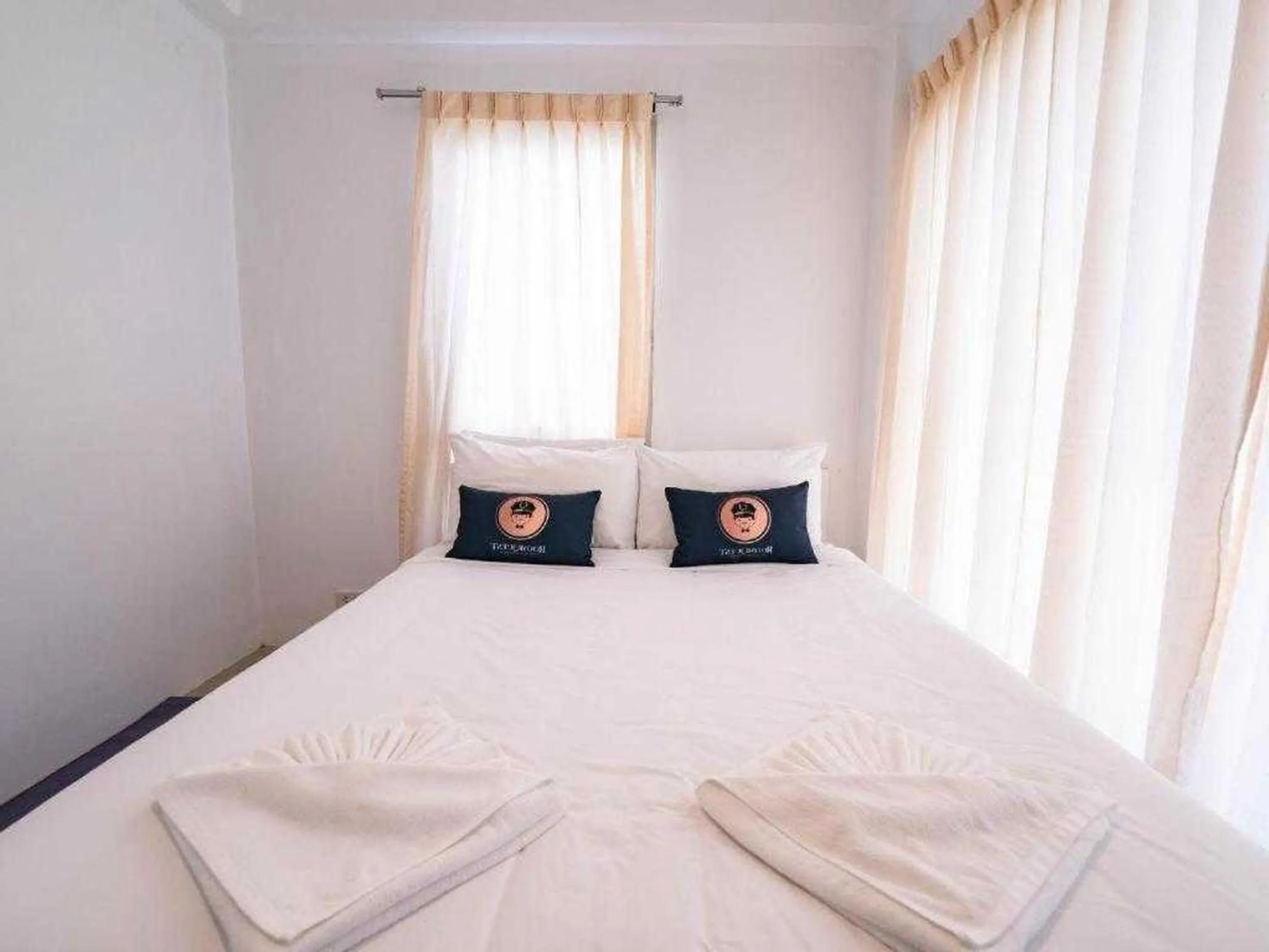 Bed in RQ Bangkok Sukhumvit 50 by Collection O