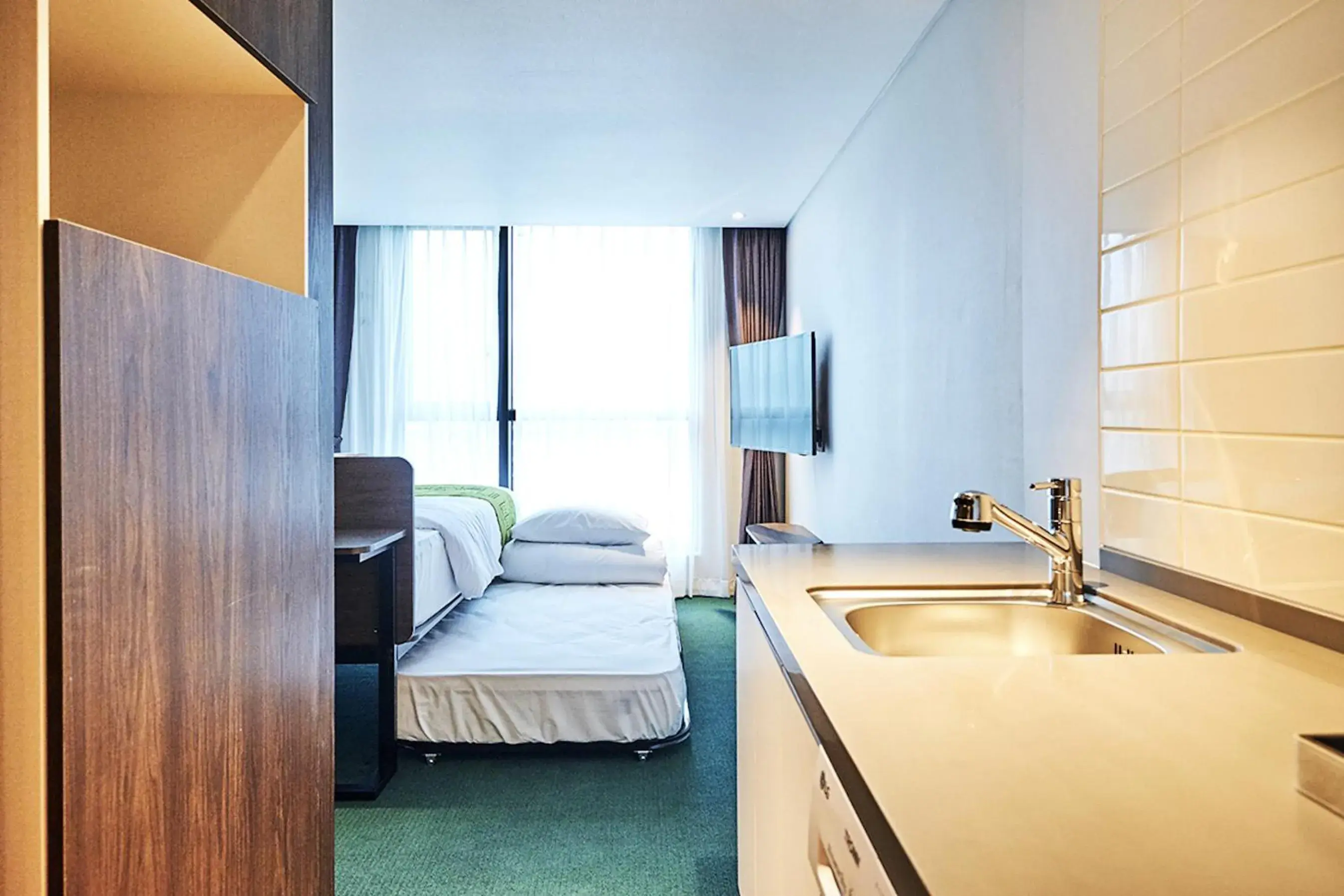 Bed in Jeju Pureun Hotel Bed in Jeju Pureun Hotel