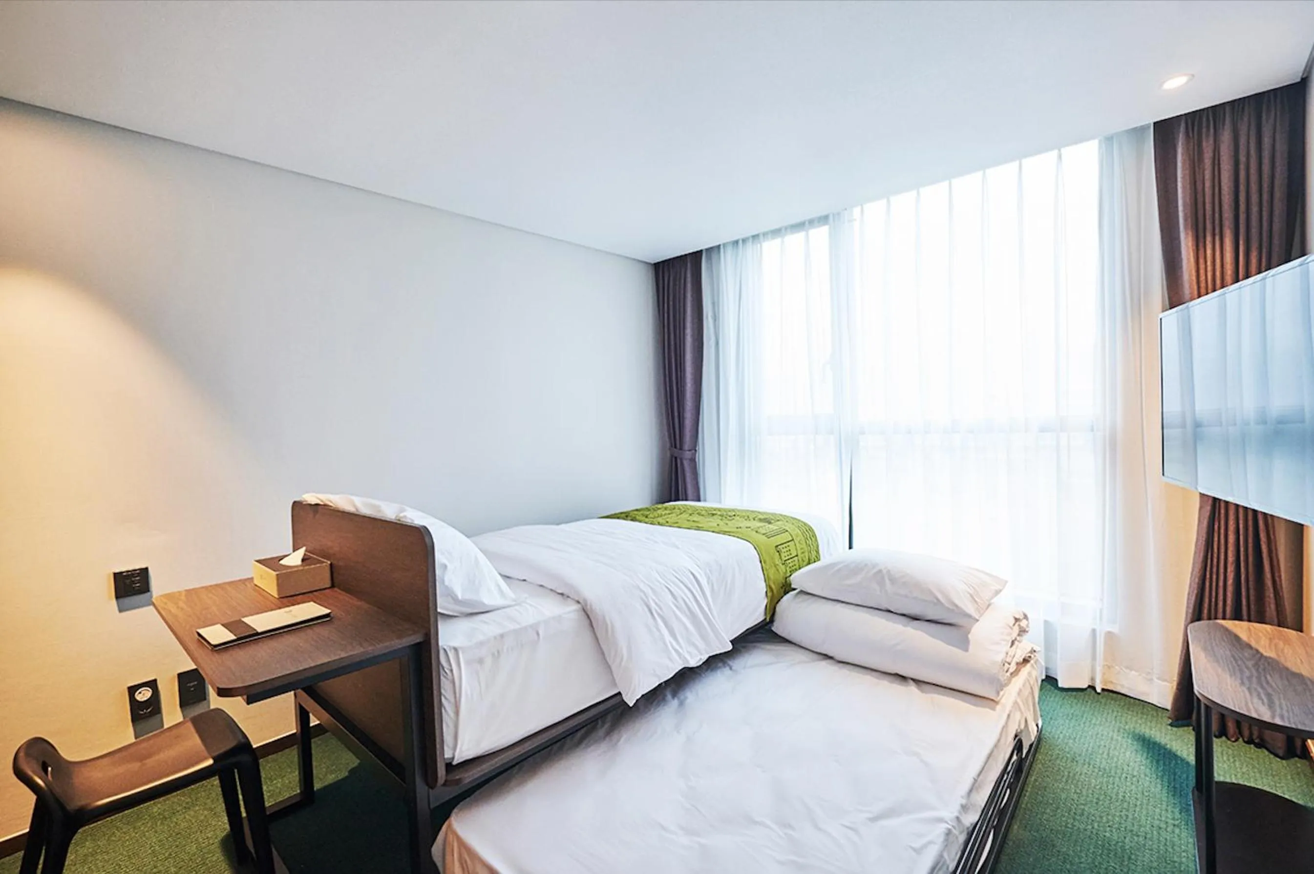 Bed in Jeju Pureun Hotel