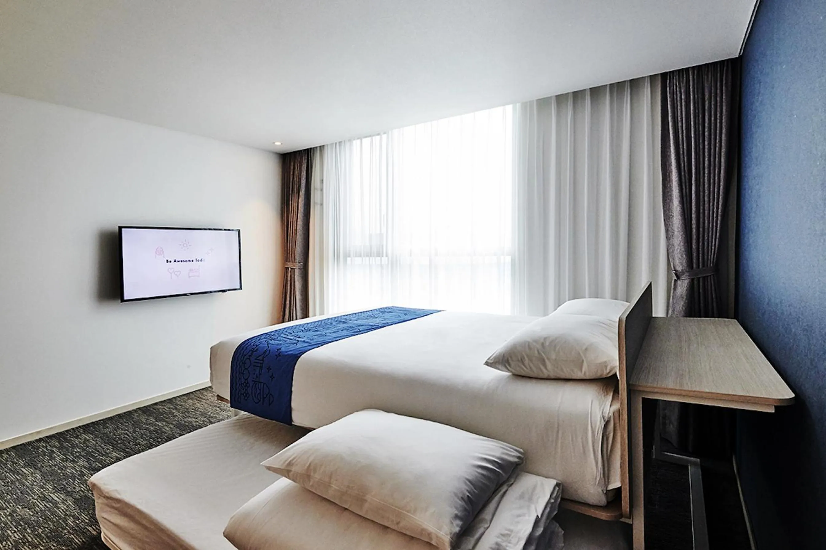 Bed in Jeju Pureun Hotel