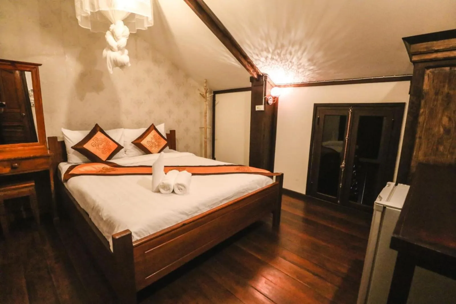 Bed in Ananta Hotel Luangprabang