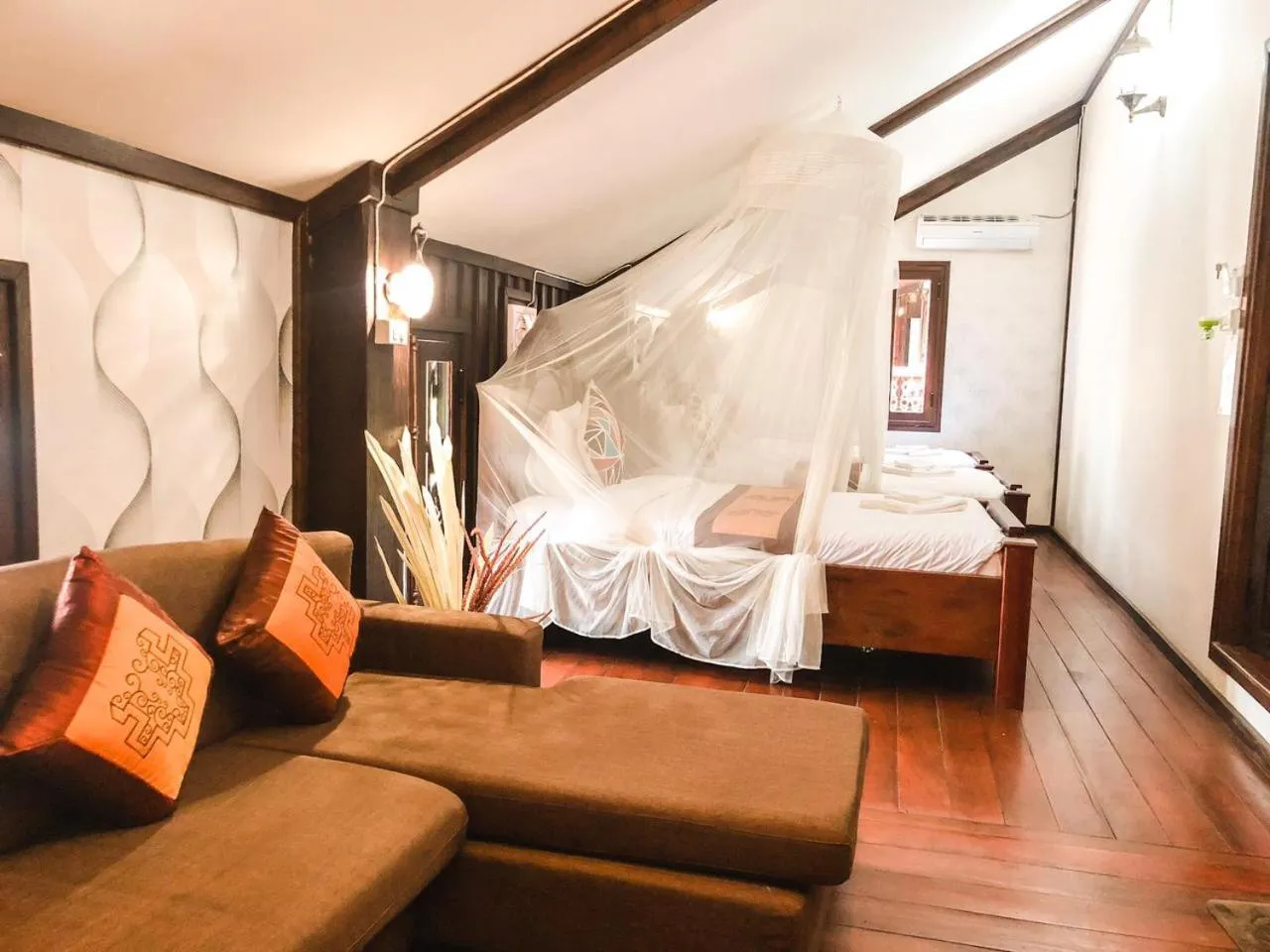 Photo of the whole room, Bed in Ananta Hotel Luangprabang