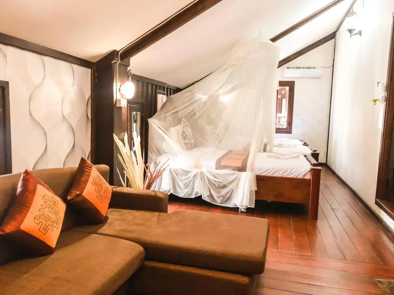 Photo of the whole room, Bed in Ananta Hotel Luangprabang Photo of the whole room, Bed in Ananta Hotel Luangprabang