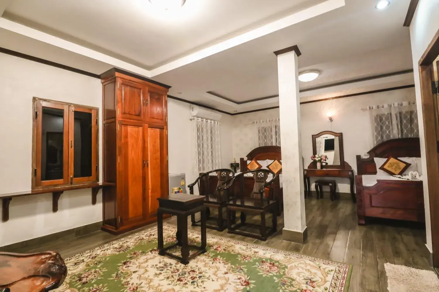 Seating area, Bed in Ananta Hotel Luangprabang Seating area, Bed in Ananta Hotel Luangprabang