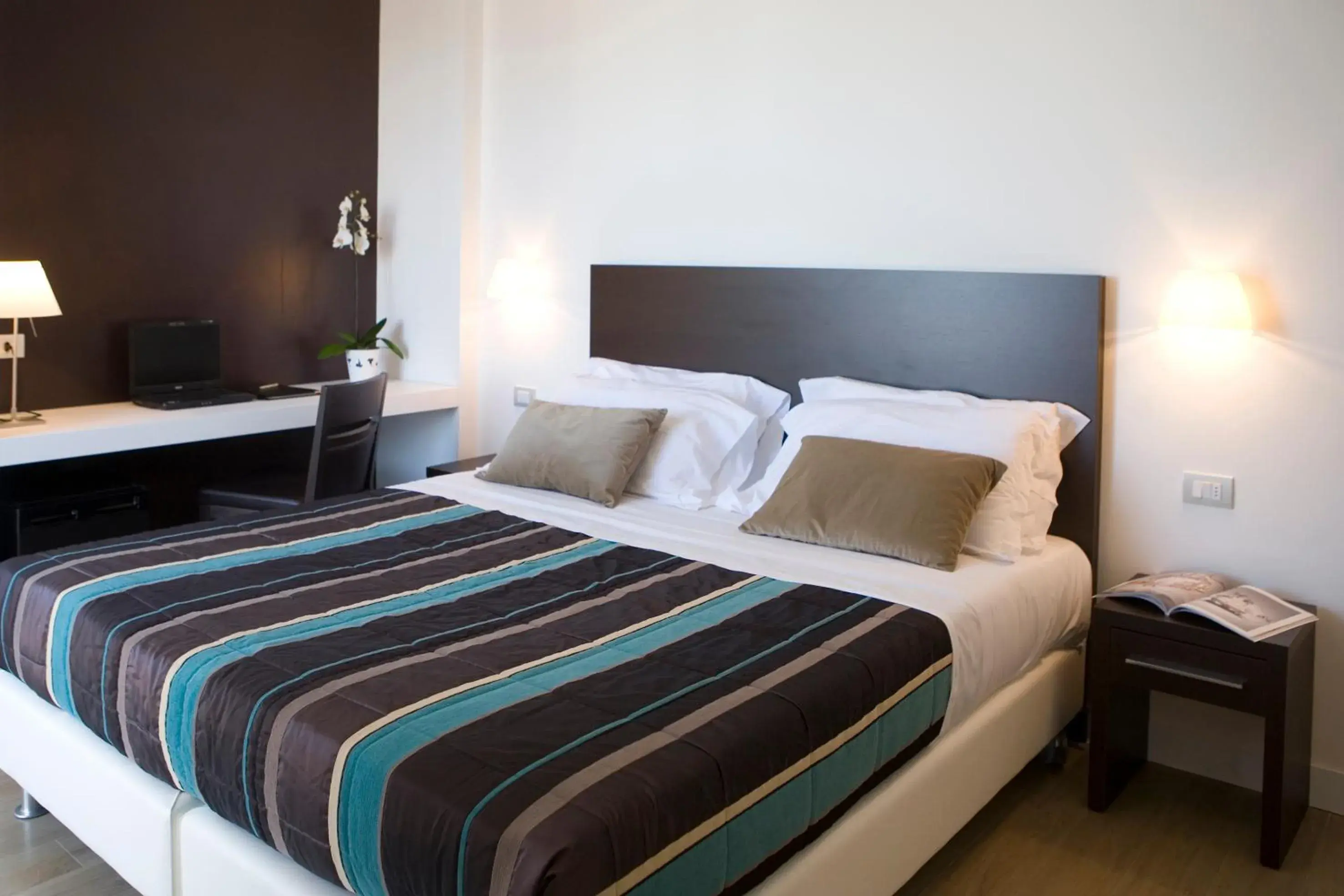 Bed in Hotel Tiffany & Resort