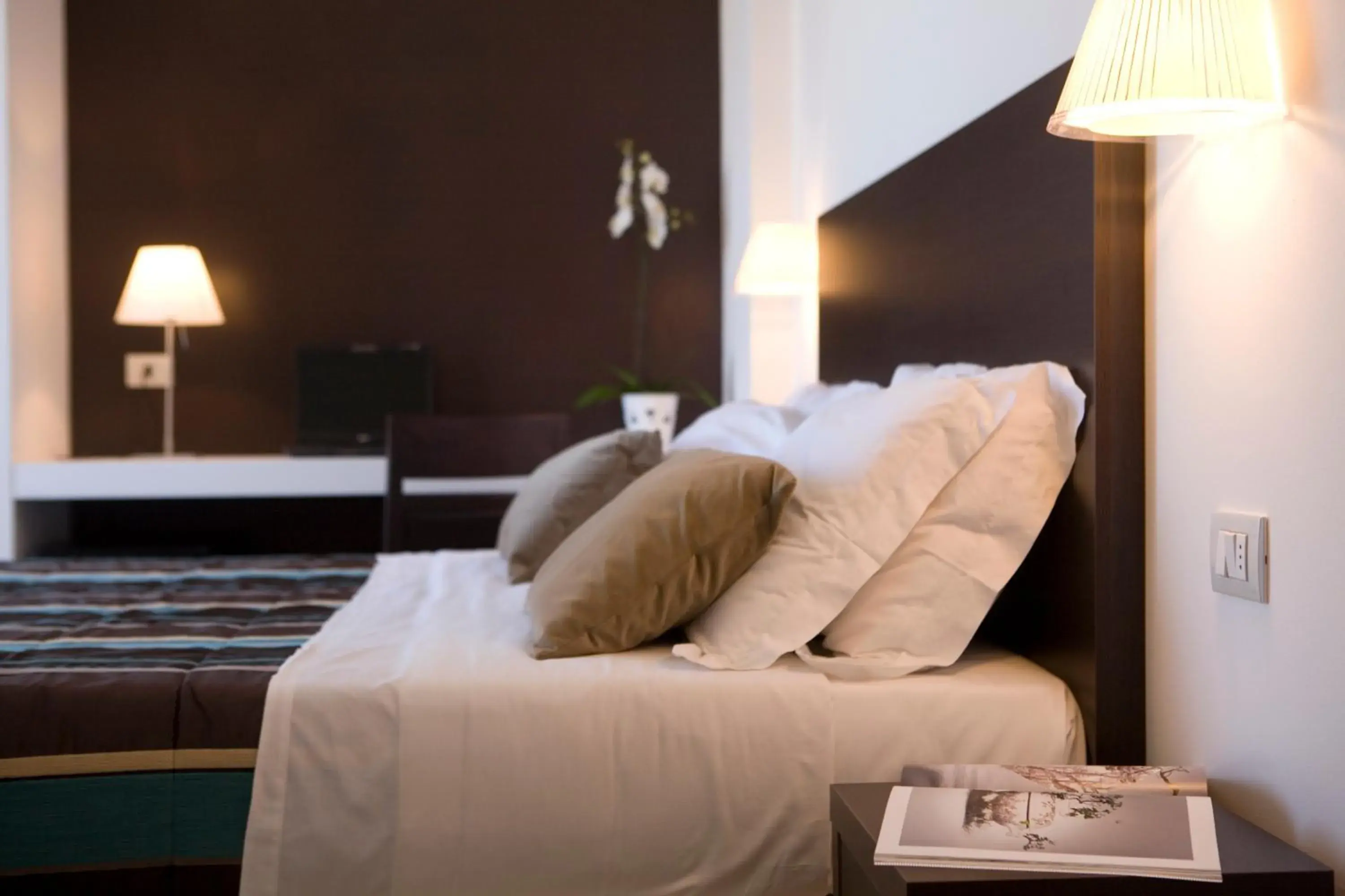 Bed in Hotel Tiffany & Resort