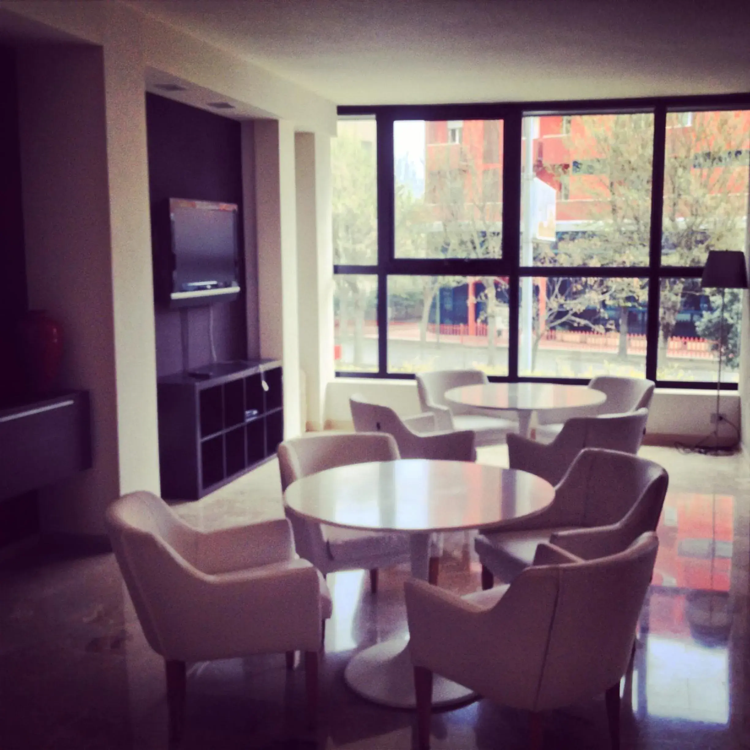 Communal lounge/ TV room in Hotel Tiffany & Resort
