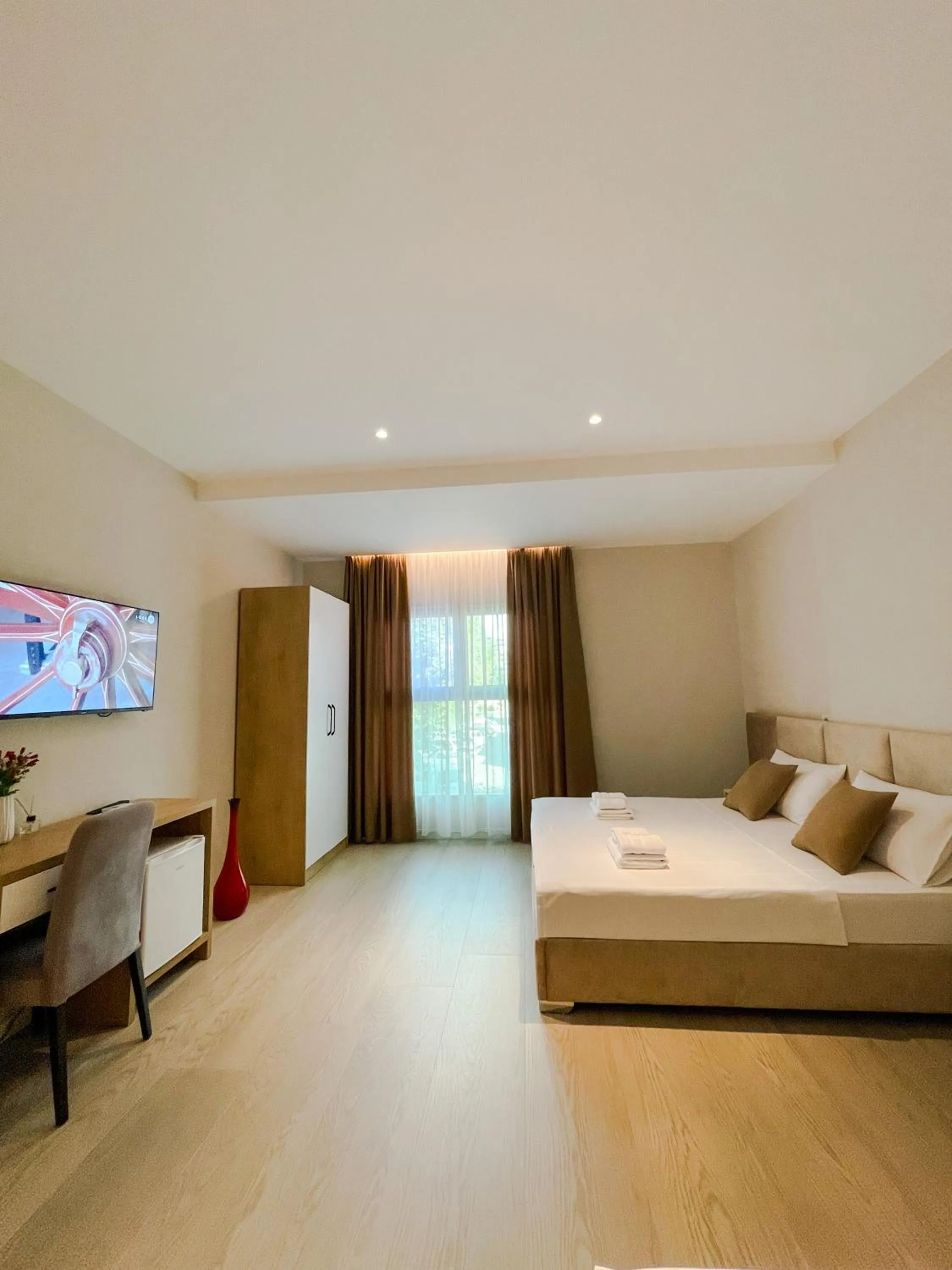 Communal lounge/ TV room, Bed in Solea Hotel