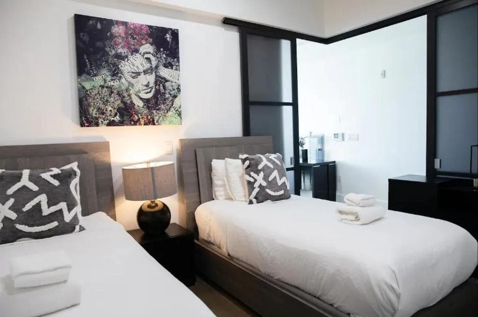 Bedroom, Bed in Dharma Home Suites Hoboken