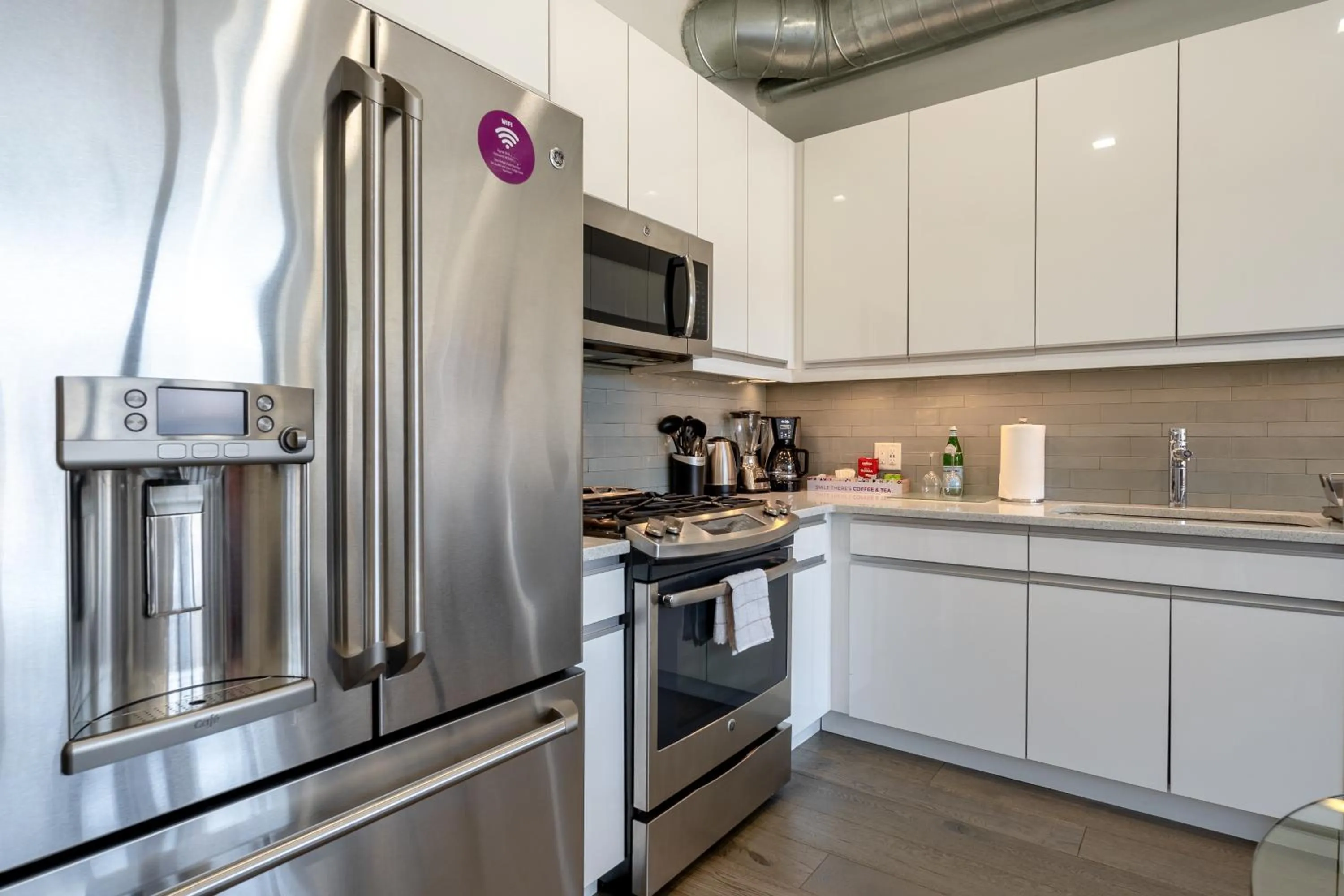 kitchen in Dharma Home Suites Hoboken
