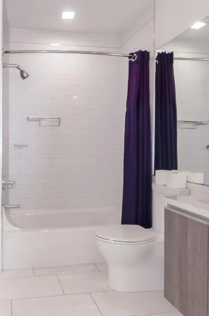 Shower in Dharma Home Suites Hoboken