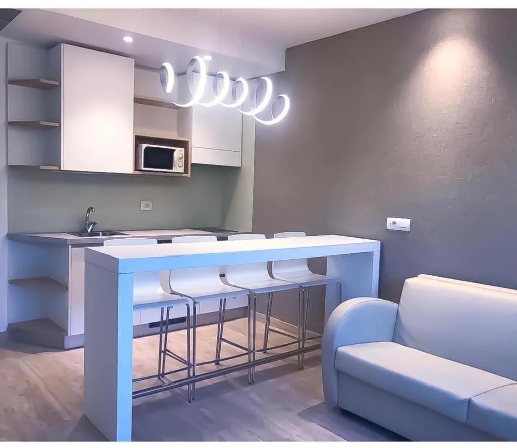 Kitchen or kitchenette in Astoria Suite Hotel