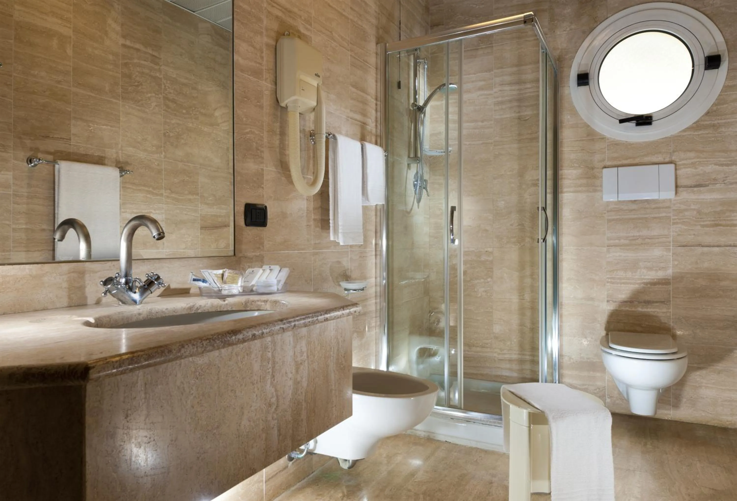 Bathroom in Astoria Suite Hotel