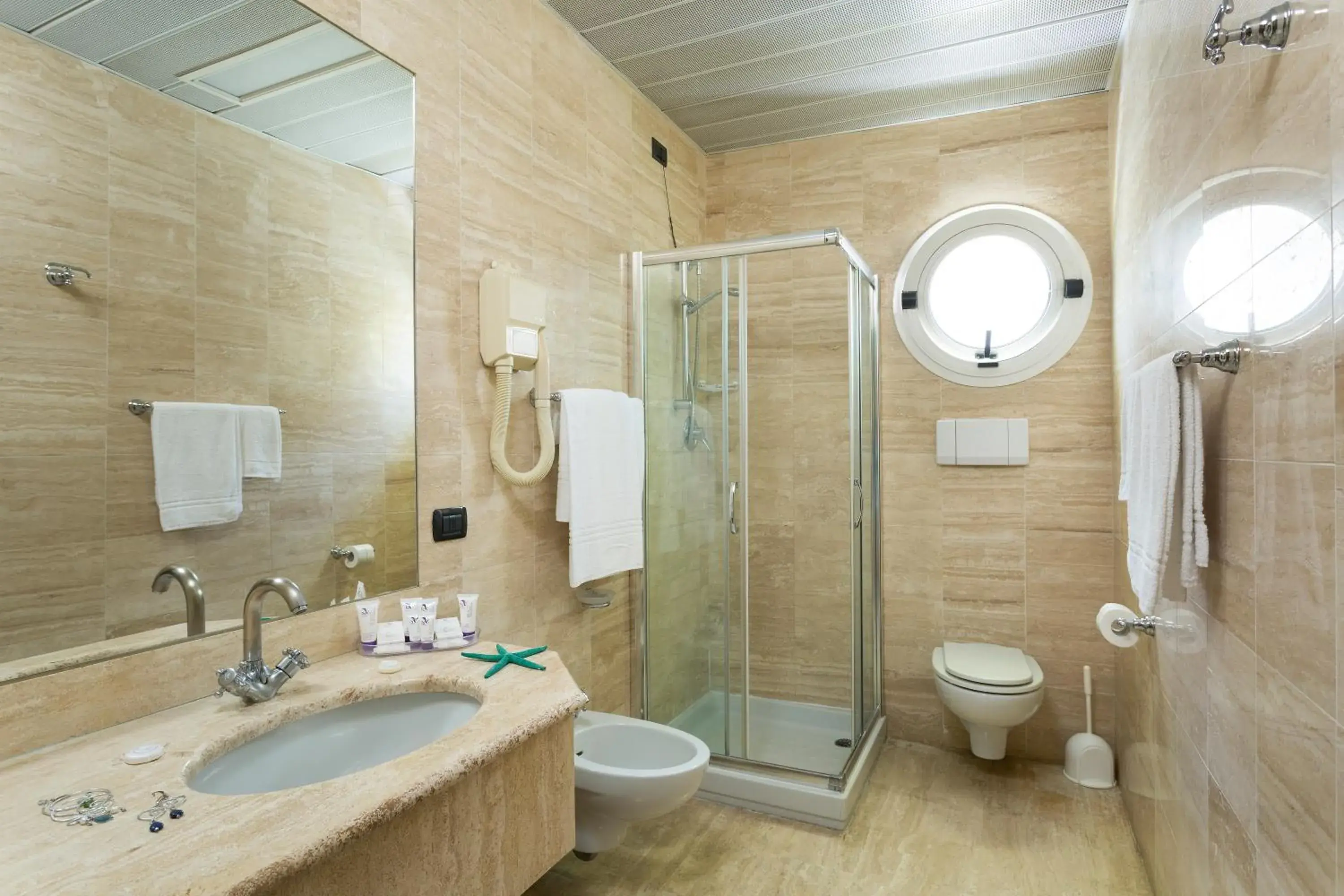 Bathroom in Astoria Suite Hotel