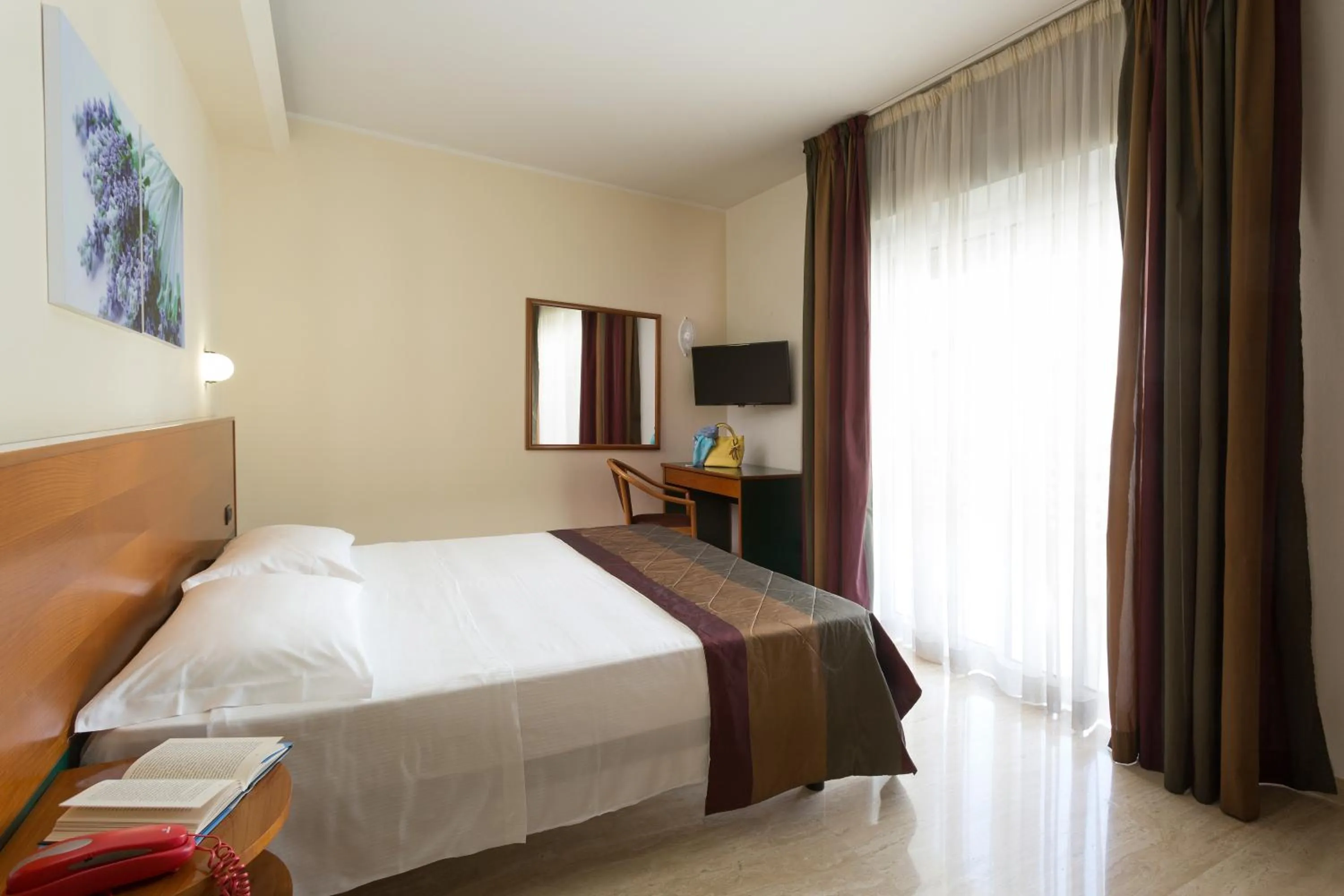 Photo of the whole room, Bed in Astoria Suite Hotel