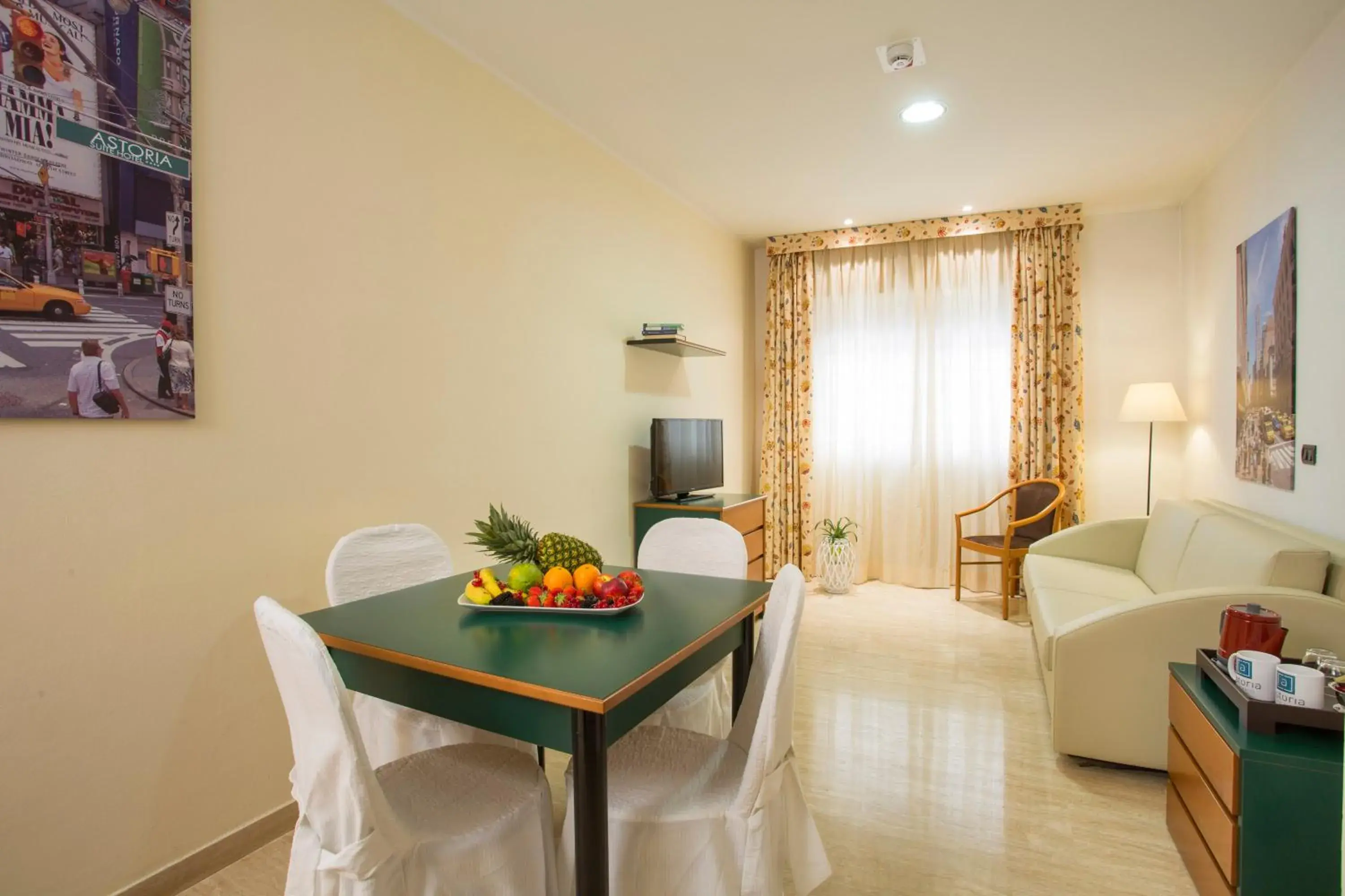 Photo of the whole room, Dining Area in Astoria Suite Hotel