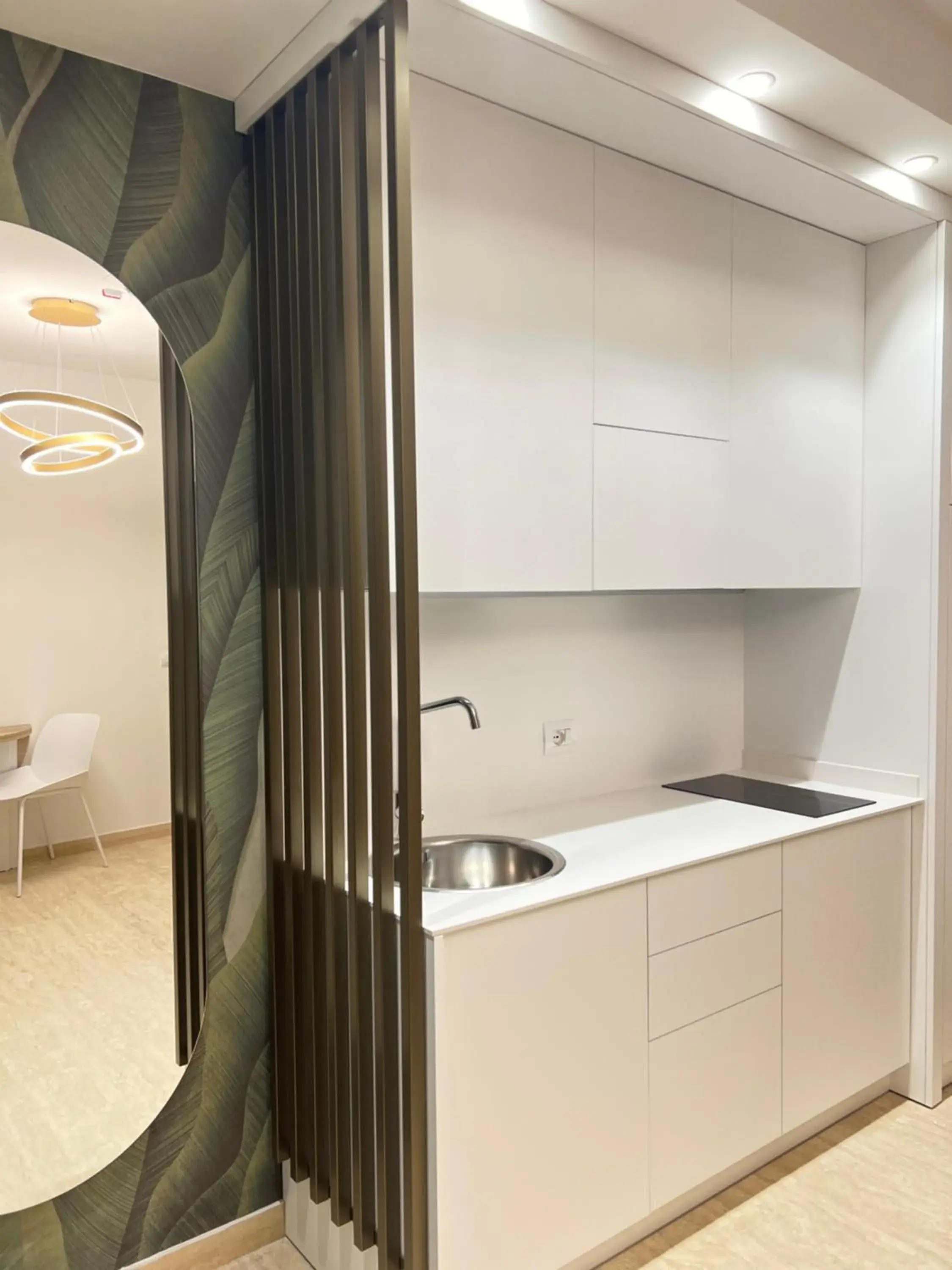 Kitchen or kitchenette, Bathroom in Astoria Suite Hotel