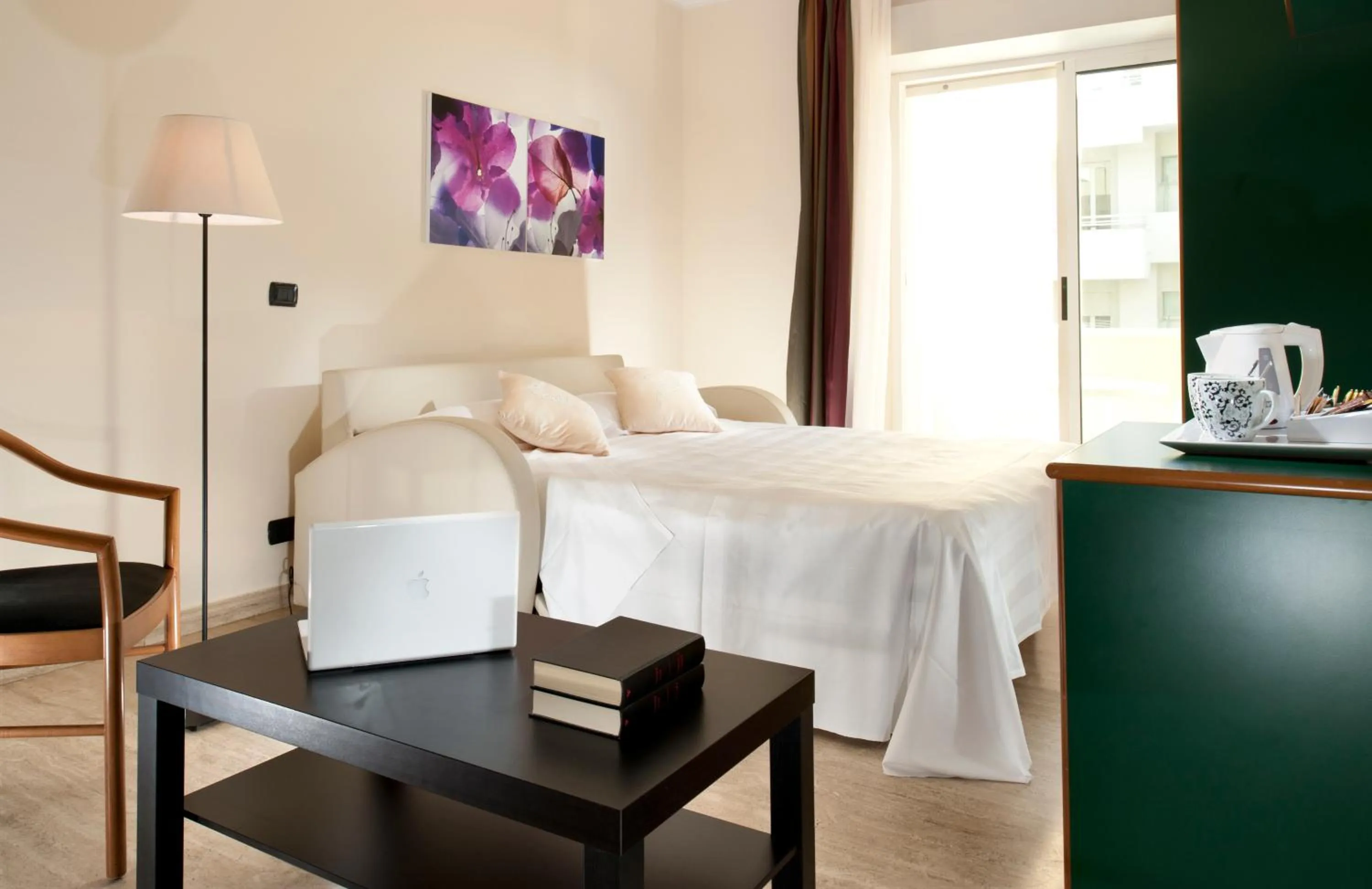 Photo of the whole room, Bed in Astoria Suite Hotel