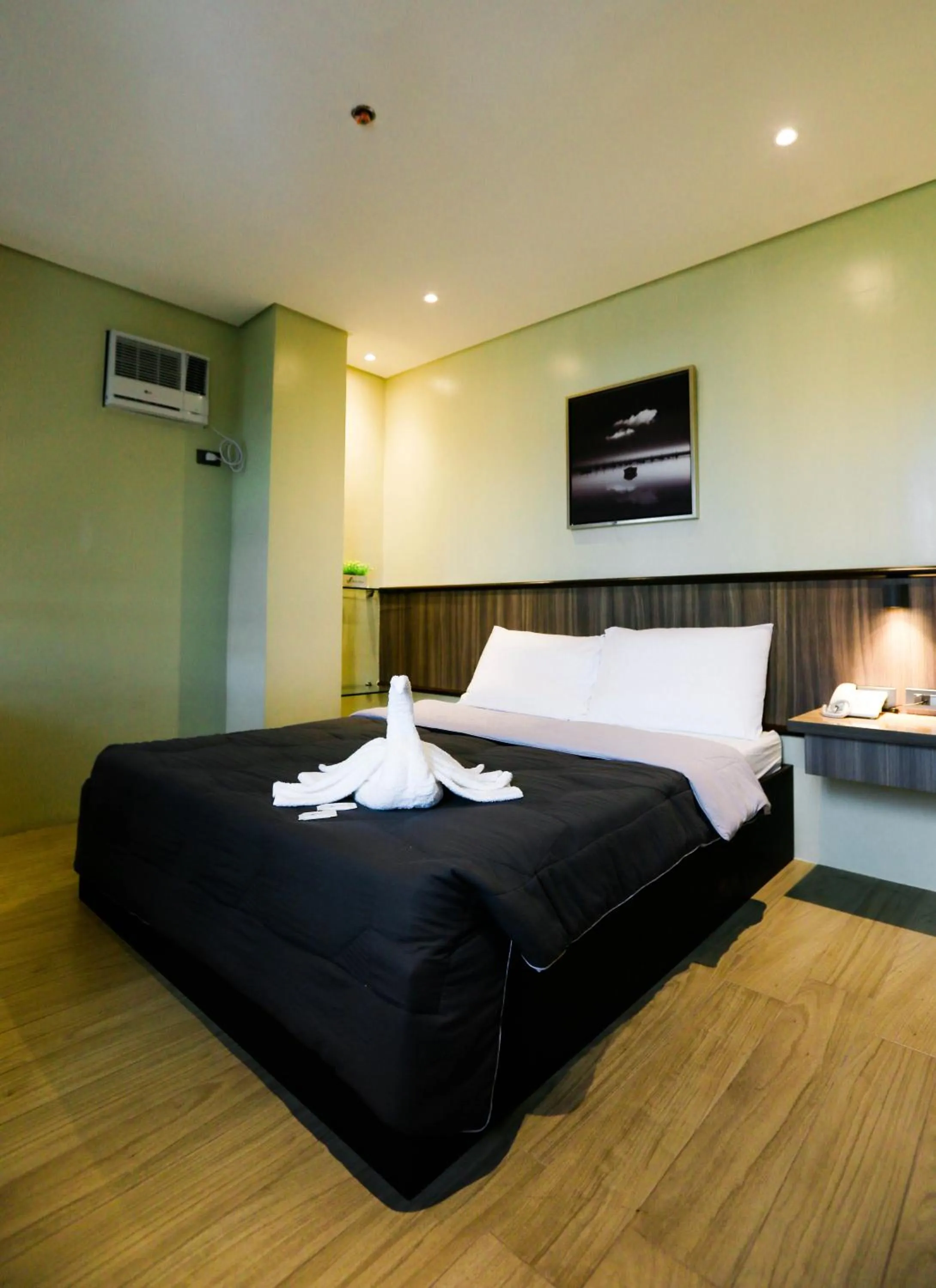 Bed in PILAR MARINA INN