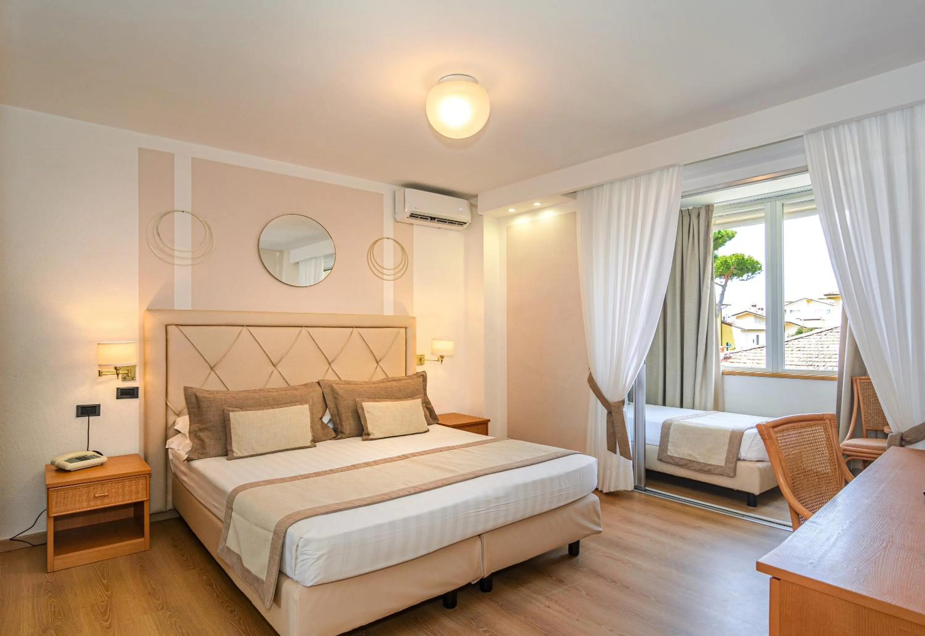 Bed in Raffaelli Park Hotel