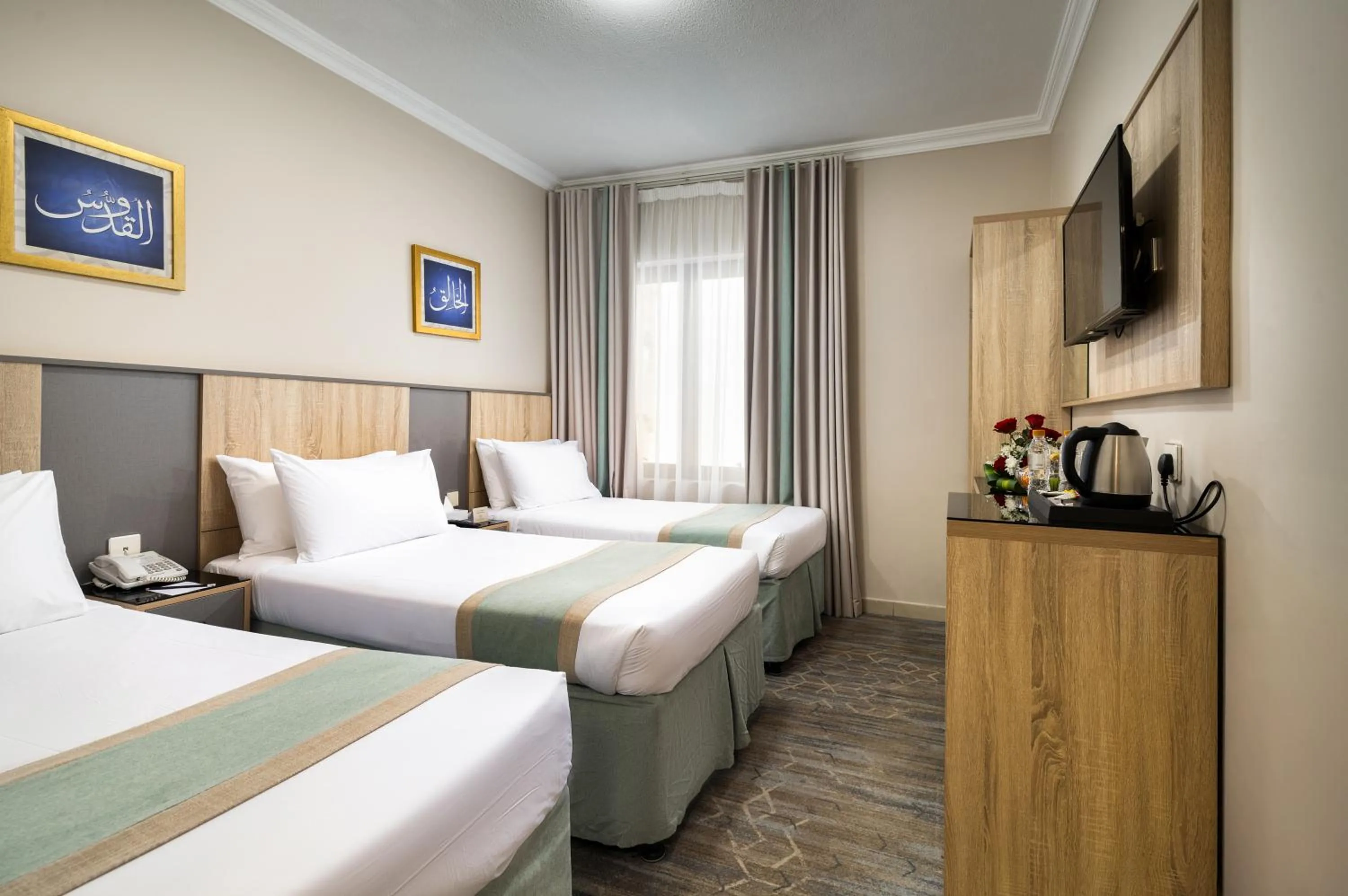 Bed in Emaar Taiba Hotel