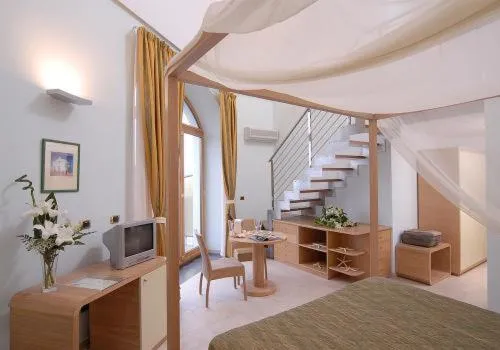 Bed in Hotel Villa Carolina