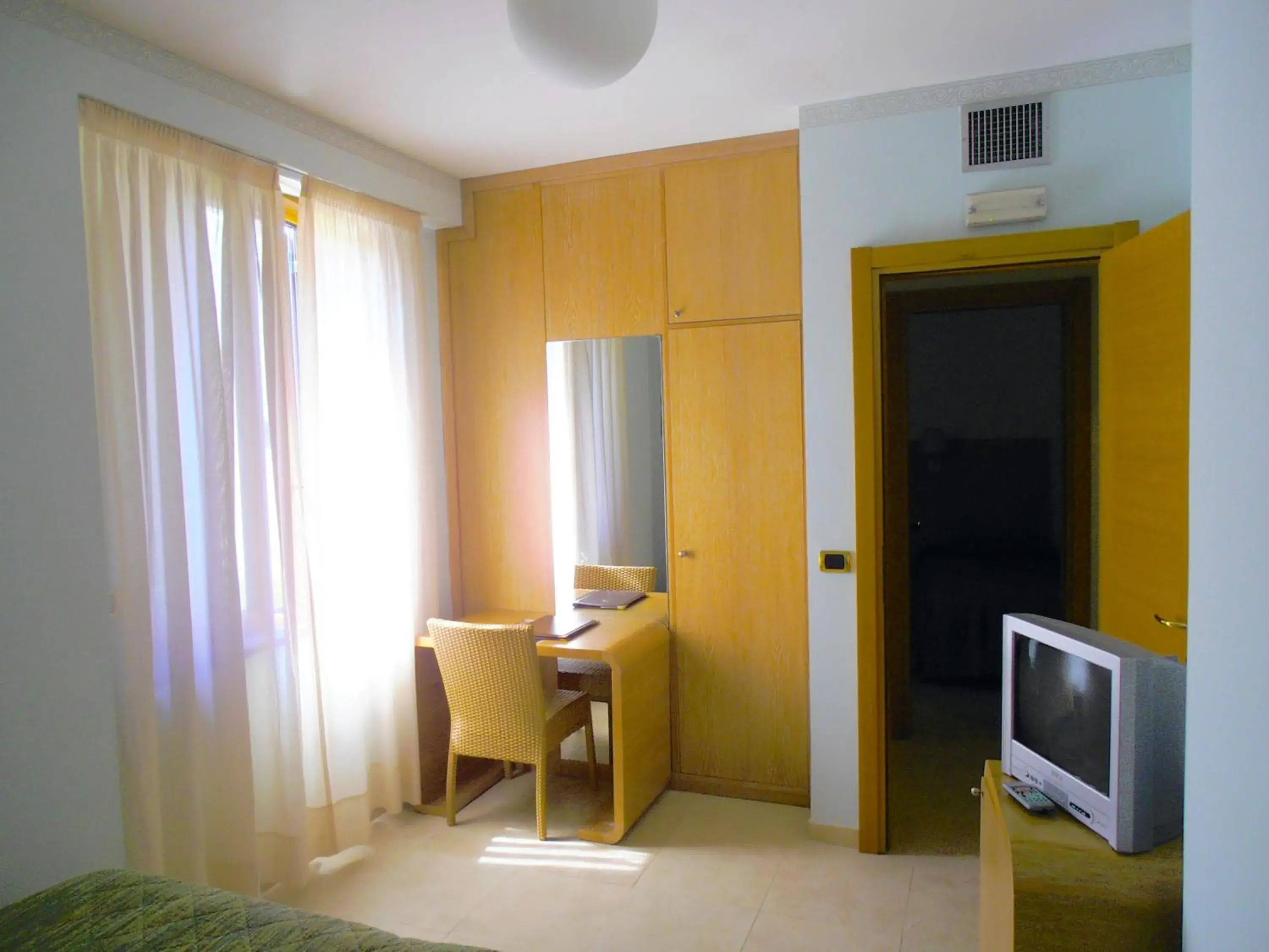 Quadruple Room in Hotel Villa Carolina Quadruple Room in Hotel Villa Carolina