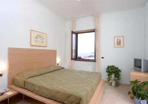 Bed in Hotel Villa Carolina Bed in Hotel Villa Carolina