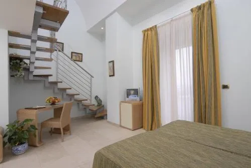 Bed in Hotel Villa Carolina