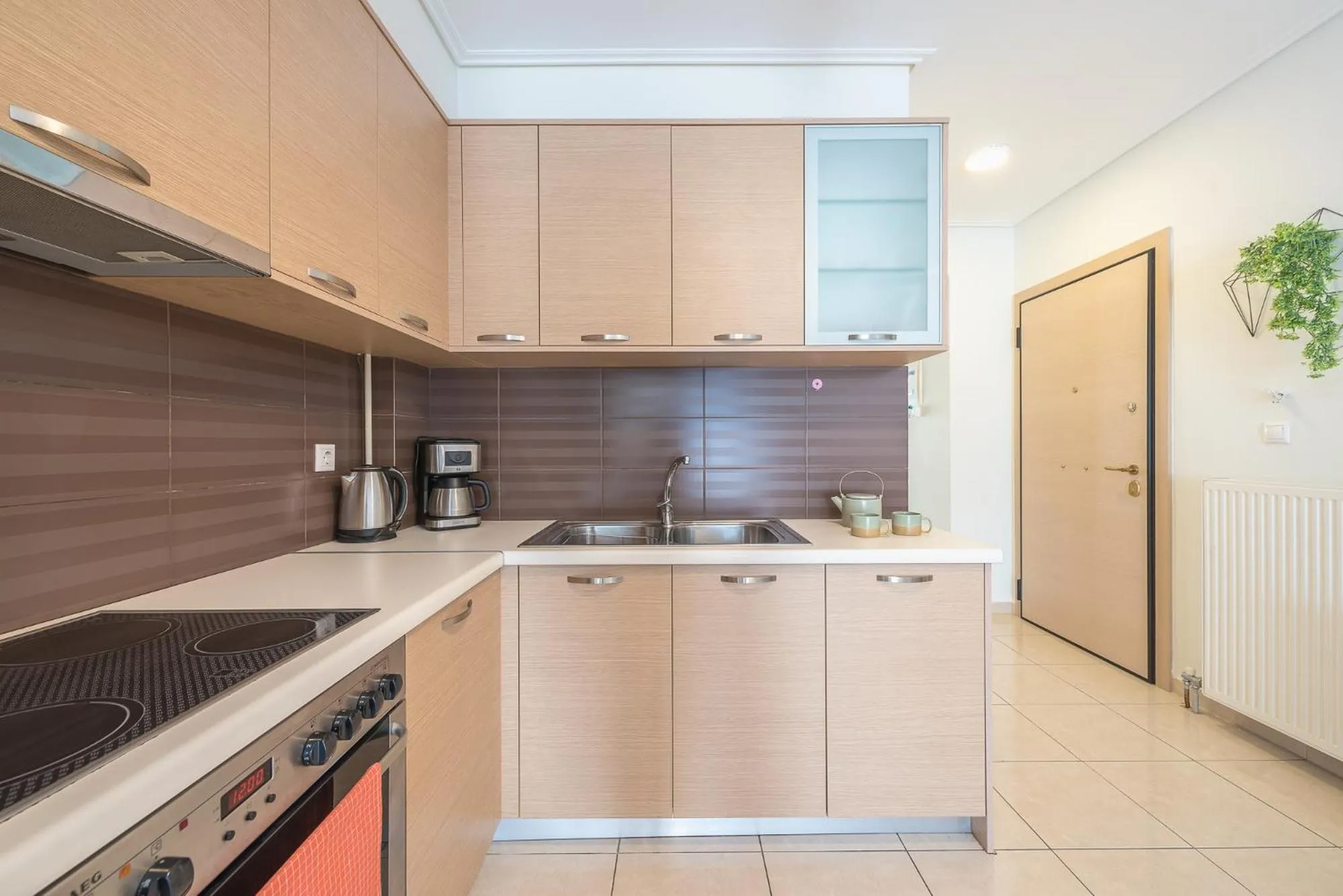 kitchen in Elegant Home with Balcony by CloudKeys