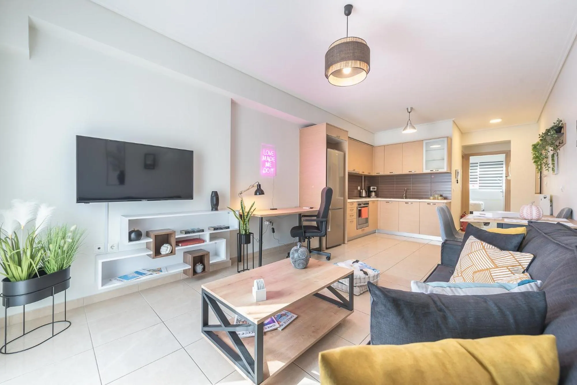 TV and multimedia in Elegant Home with Balcony by CloudKeys