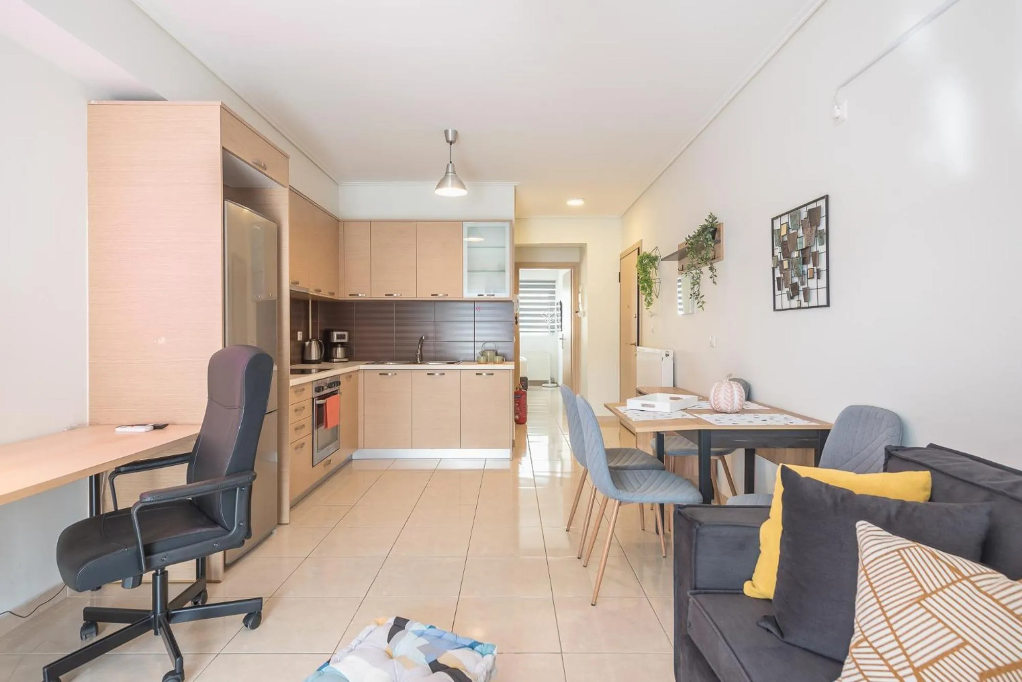 Kitchen or kitchenette in Elegant Home with Balcony by CloudKeys