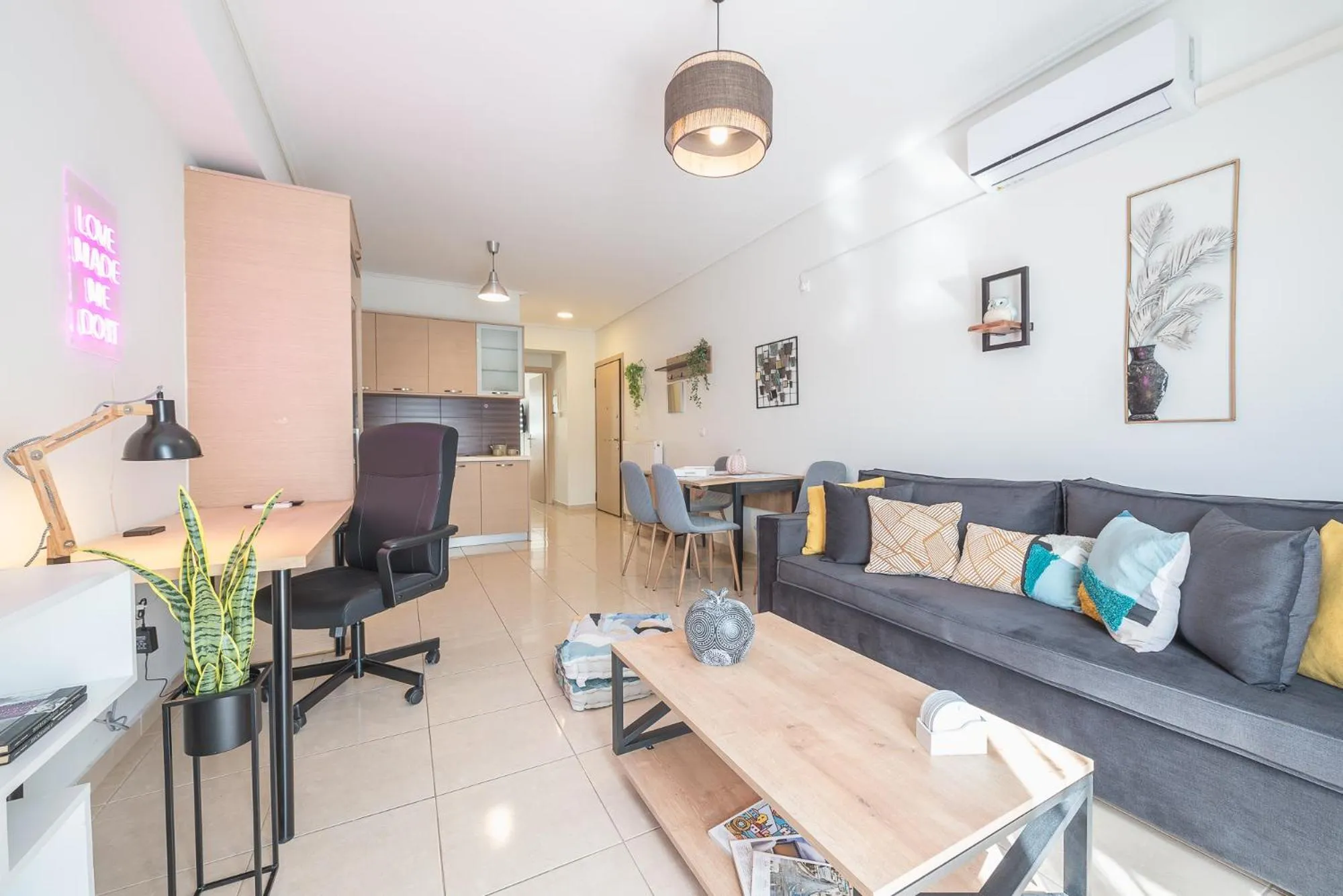 TV and multimedia in Elegant Home with Balcony by CloudKeys