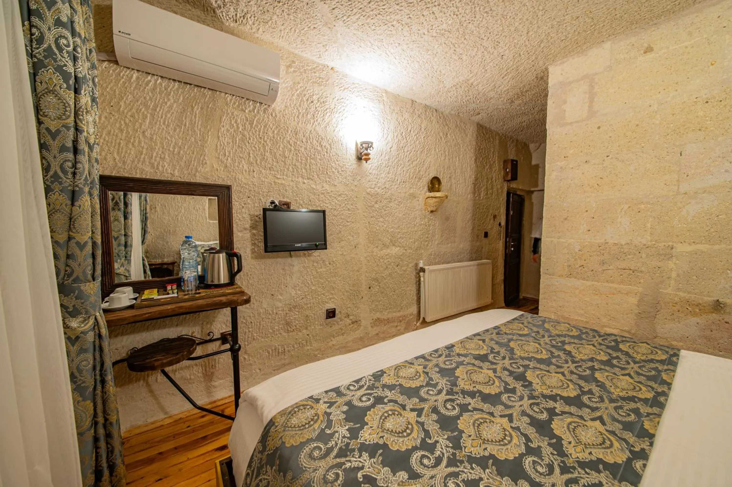 Bed in Ascension Cave Suites - Special Class