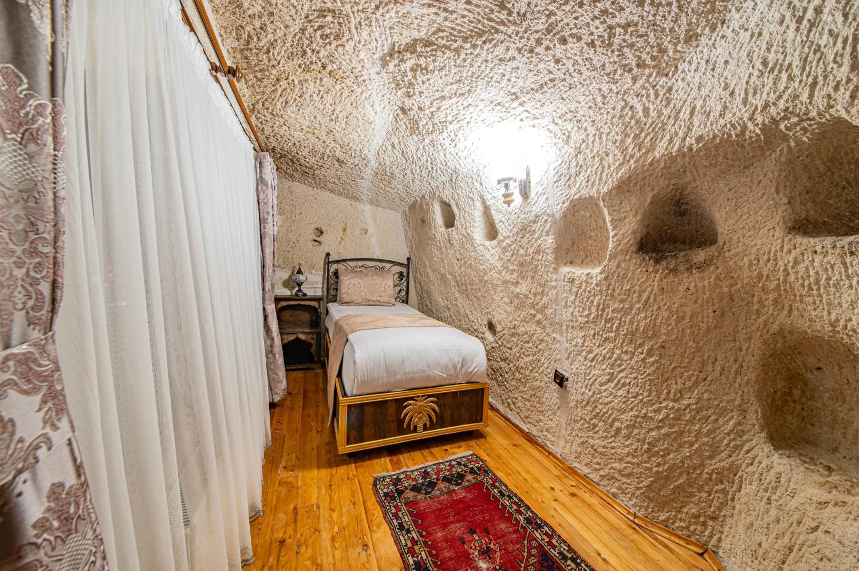 Bed in Ascension Cave Suites - Special Class