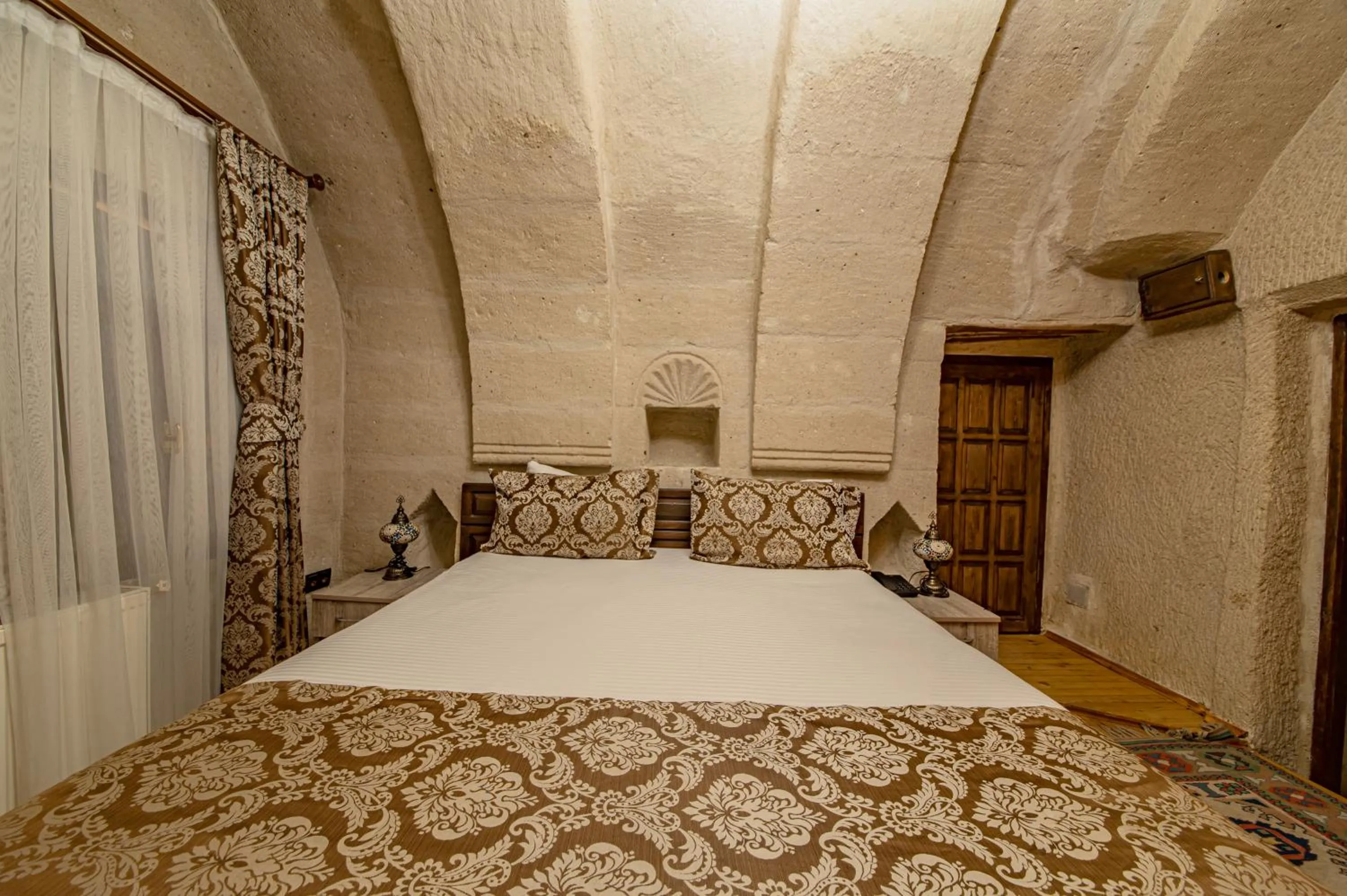 Bed in Ascension Cave Suites - Special Class