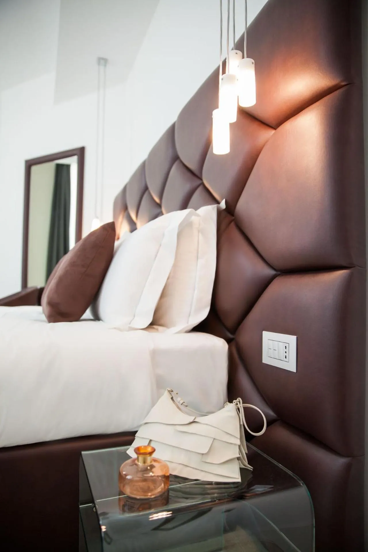Bed in Sanremo Luxury Suites