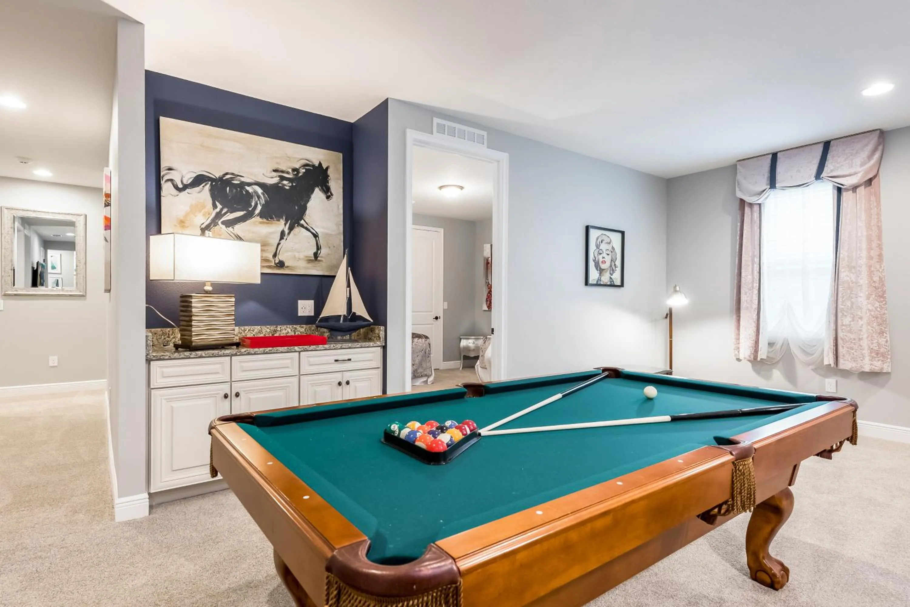 Communal lounge/ TV room in Encore Resort and Water Park at Reunion by Rentyl