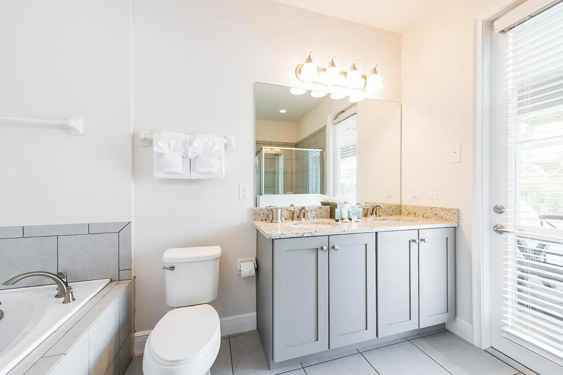 Toilet in Encore Resort and Water Park at Reunion by Rentyl