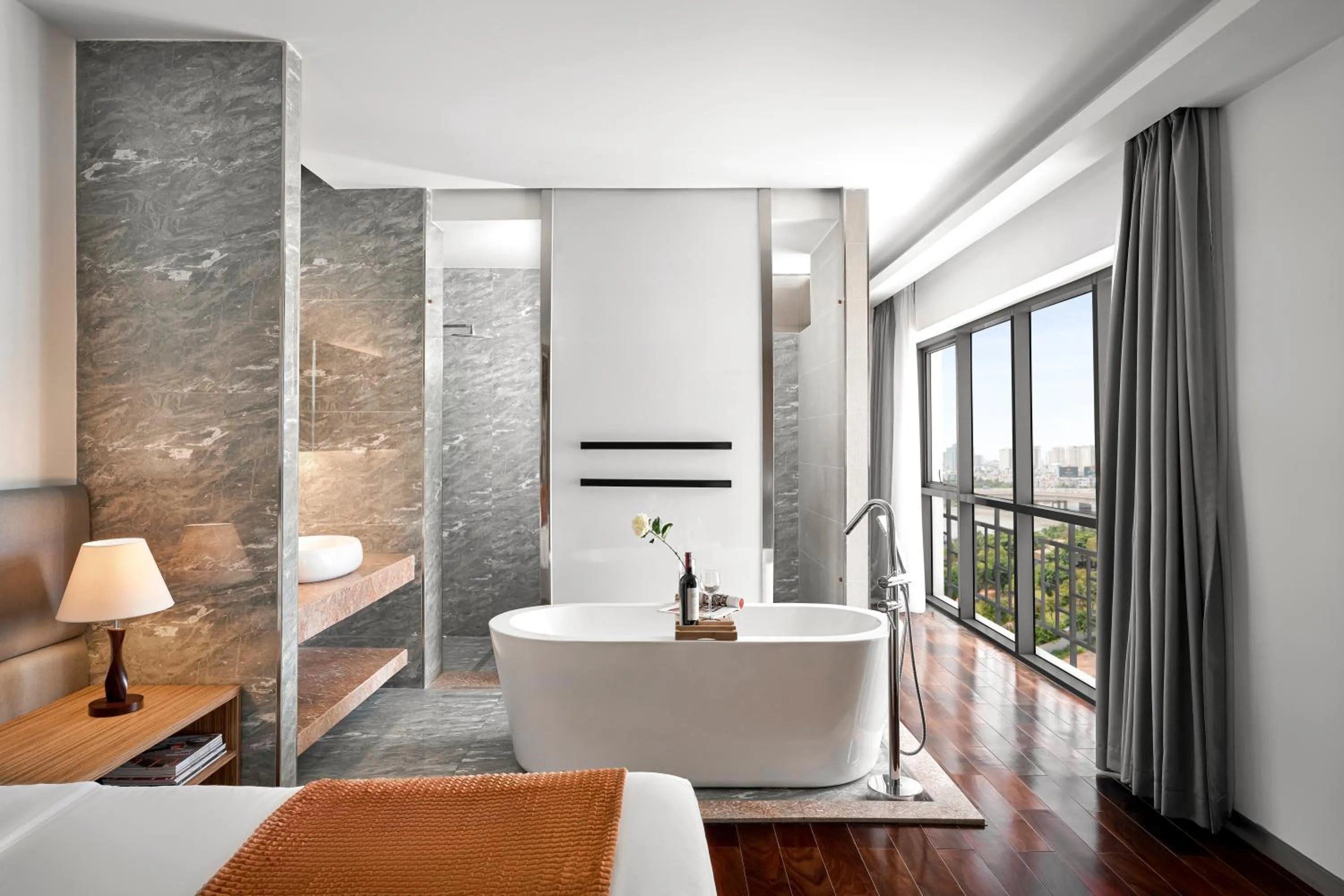 Bathroom, Bed in Oakwood Hotel & Apartments Saigon