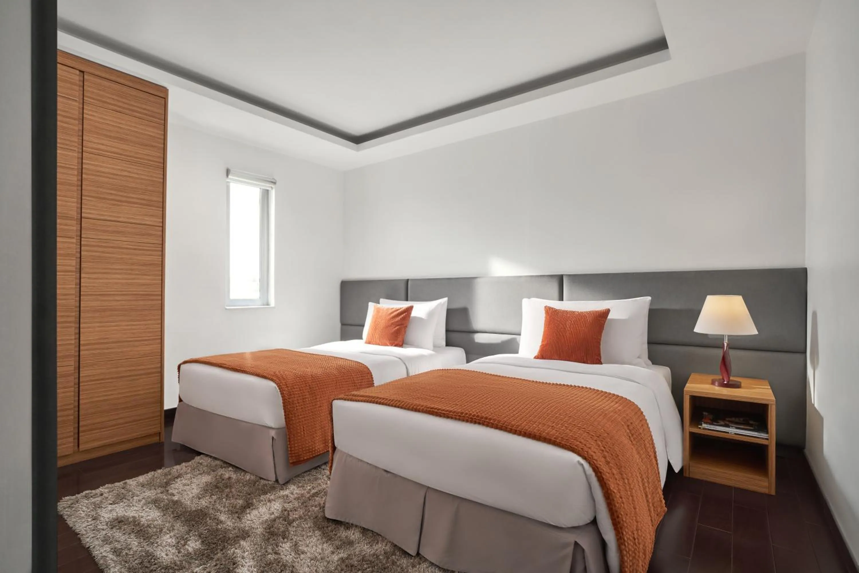 Bed in Oakwood Hotel & Apartments Saigon