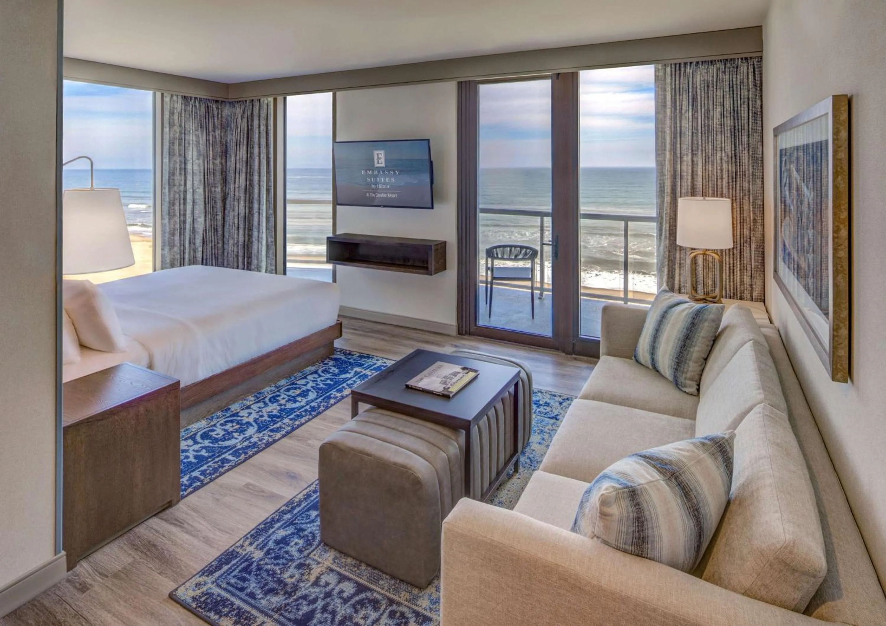 Living room, Bed in Embassy Suites By Hilton Virginia Beach Oceanfront Resort