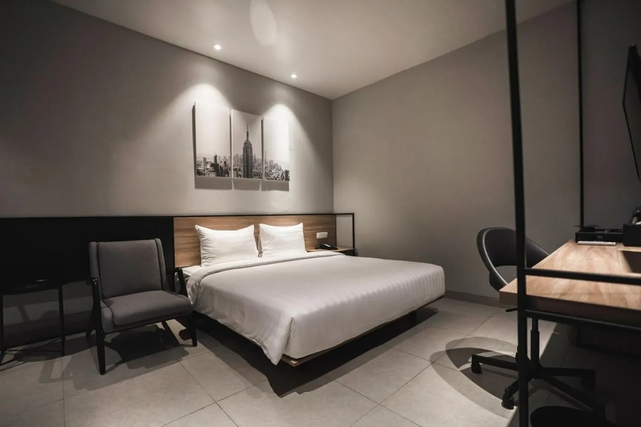 Bed in Conjioo Hotel Jakarta Managed by MHM
